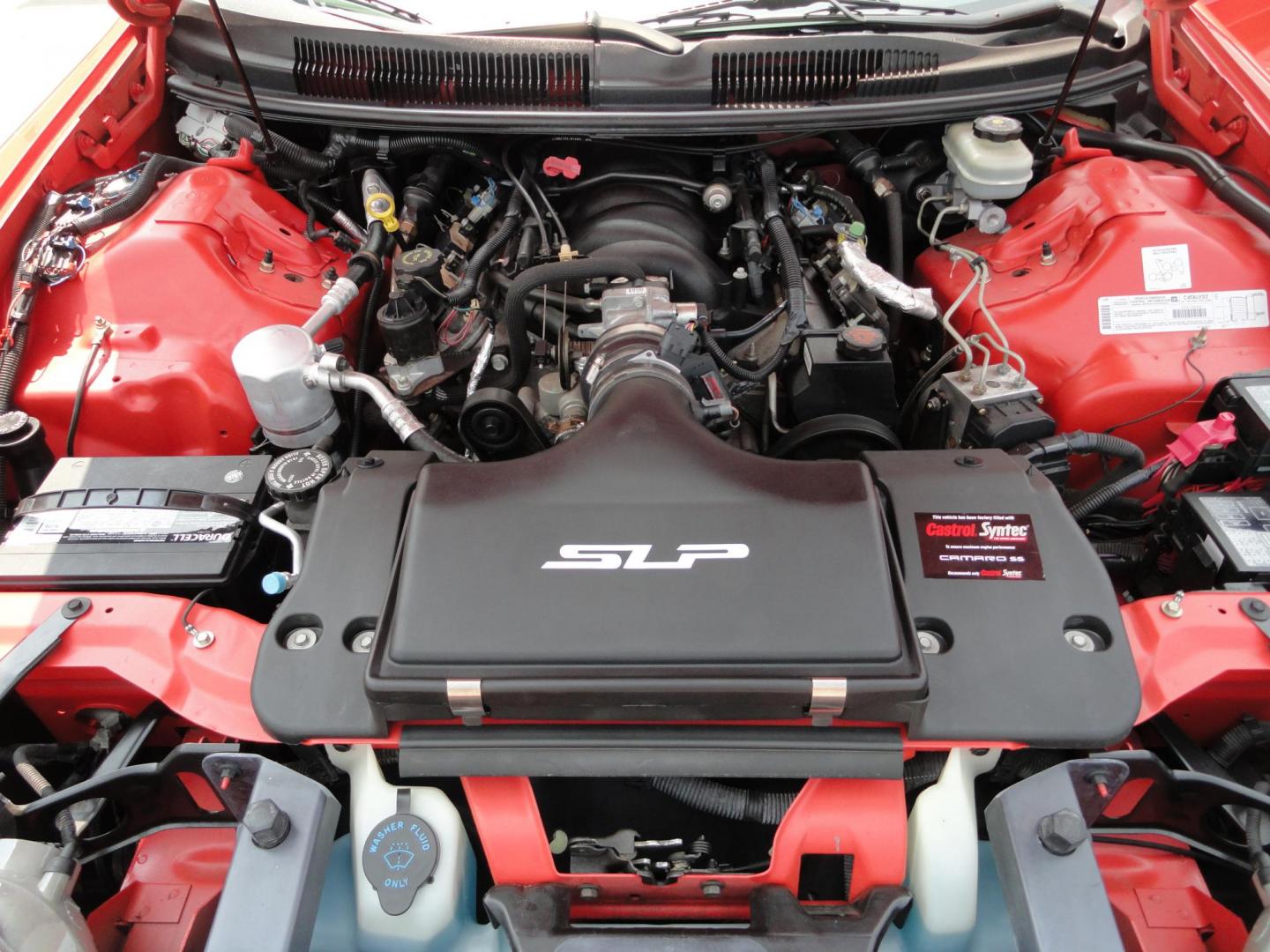 1999 Hugger Orange /Gray Chevrolet Camaro SS (2G1FP32G6X2) with an 5.7L V8 OHV 16V engine, 4-Speed Automatic Overdrive transmission, located at 827 W 26th Street, Erie, PA, 16508, (814) 455-3401, 42.105431, -80.090942 - Thanks for looking at our super clean like new rare low mileage Camaro. This is the SS model with the SLP package in the rare color of Hugger orange. We sold this vehicle a few years back to a collector who recently has some health issues and sold it back to us along with a few others of his collect - Photo#39