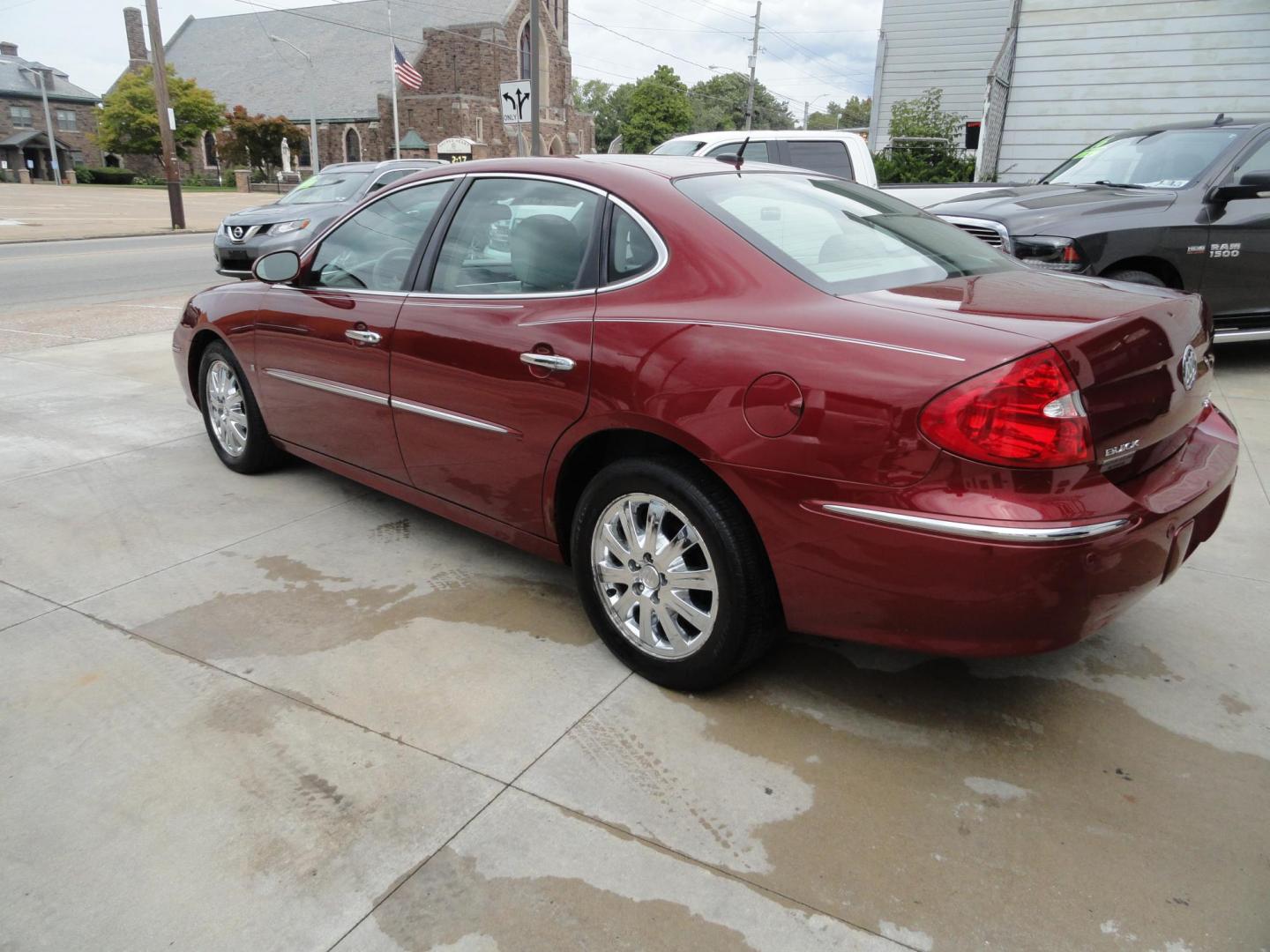 2009 Crystal Red Metallic /Greystone Buick LaCrosse CXL (2G4WD582091) with an 3.8L V6 OHV 12V engine, 4-Speed Automatic transmission, located at 827 W 26th Street, Erie, PA, 16508, (814) 455-3401, 42.105431, -80.090942 - Thanks for looking at our accident-free recent arrival. This is the CXL model with lots of options including the 3800 V6, heated leather seats, factory remote start, chrome wheels and lots more. I know this has a few miles, but it was well cared for by its previous owners as can be seen by its extra - Photo#5