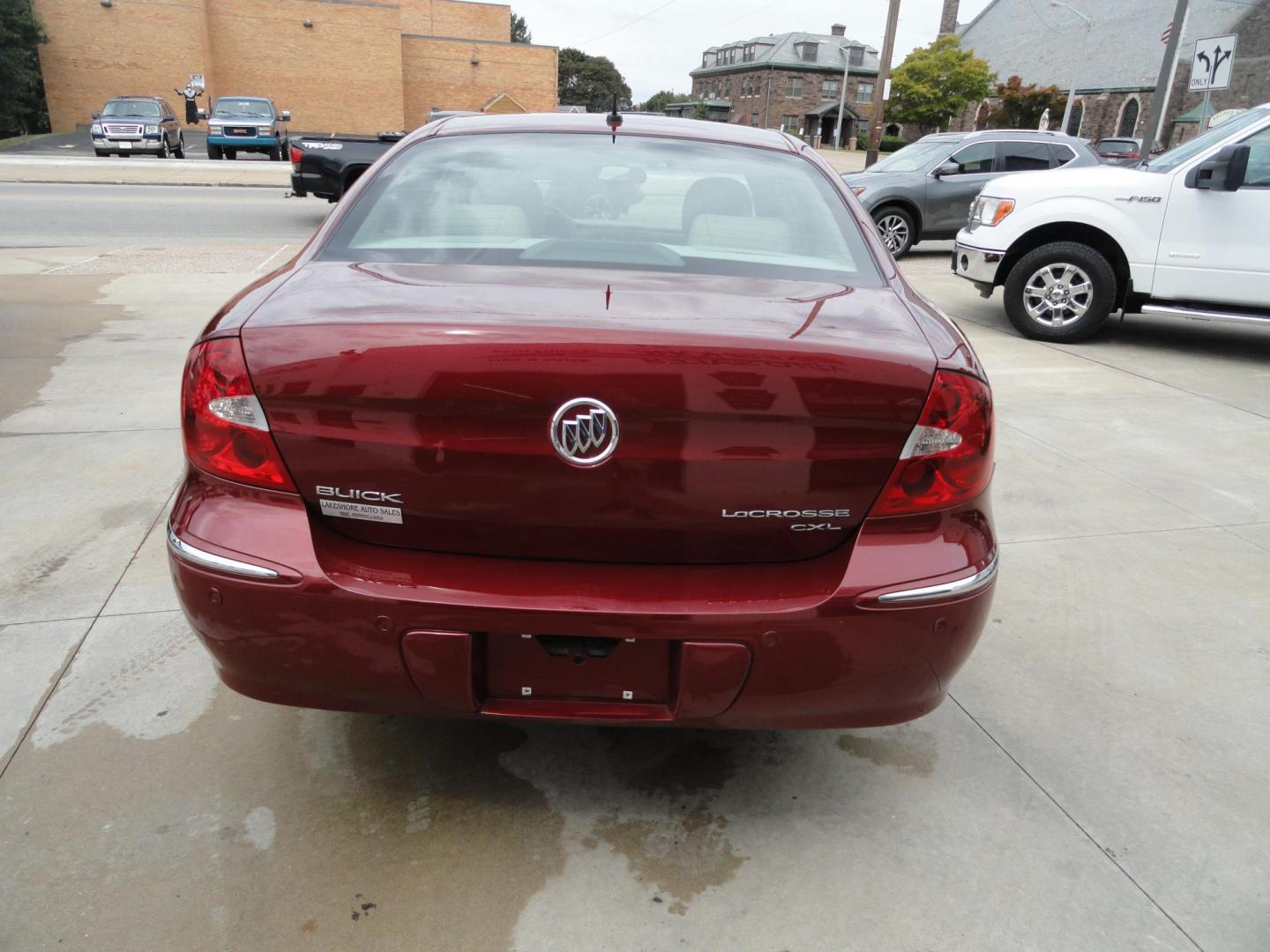 2009 Crystal Red Metallic /Greystone Buick LaCrosse CXL (2G4WD582091) with an 3.8L V6 OHV 12V engine, 4-Speed Automatic transmission, located at 827 W 26th Street, Erie, PA, 16508, (814) 455-3401, 42.105431, -80.090942 - Thanks for looking at our accident-free recent arrival. This is the CXL model with lots of options including the 3800 V6, heated leather seats, factory remote start, chrome wheels and lots more. I know this has a few miles, but it was well cared for by its previous owners as can be seen by its extra - Photo#4