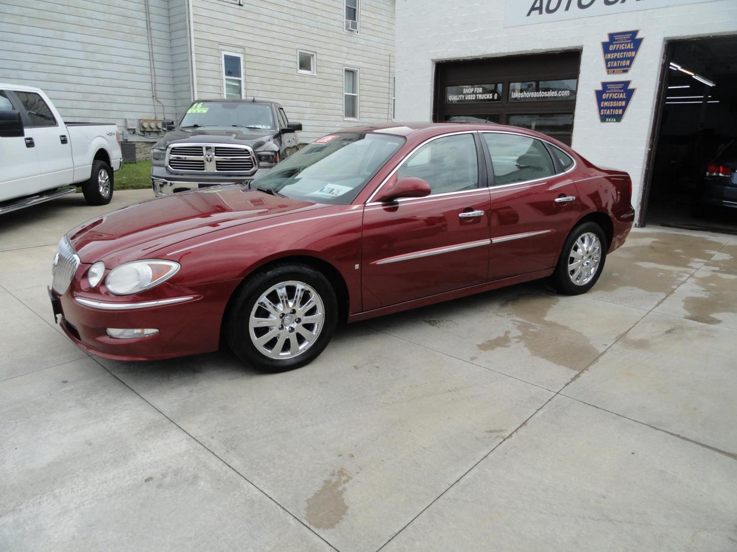 2009 Crystal Red Metallic /Greystone Buick LaCrosse CXL (2G4WD582091) with an 3.8L V6 OHV 12V engine, 4-Speed Automatic transmission, located at 827 W 26th Street, Erie, PA, 16508, (814) 455-3401, 42.105431, -80.090942 - Thanks for looking at our accident-free recent arrival. This is the CXL model with lots of options including the 3800 V6, heated leather seats, factory remote start, chrome wheels and lots more. I know this has a few miles, but it was well cared for by its previous owners as can be seen by its extra - Photo#6