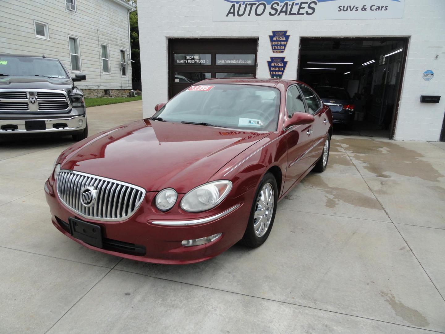 2009 Crystal Red Metallic /Greystone Buick LaCrosse CXL (2G4WD582091) with an 3.8L V6 OHV 12V engine, 4-Speed Automatic transmission, located at 827 W 26th Street, Erie, PA, 16508, (814) 455-3401, 42.105431, -80.090942 - Thanks for looking at our accident-free recent arrival. This is the CXL model with lots of options including the 3800 V6, heated leather seats, factory remote start, chrome wheels and lots more. I know this has a few miles, but it was well cared for by its previous owners as can be seen by its extra - Photo#7