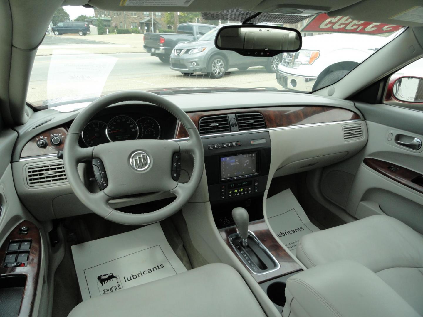 2009 Crystal Red Metallic /Greystone Buick LaCrosse CXL (2G4WD582091) with an 3.8L V6 OHV 12V engine, 4-Speed Automatic transmission, located at 827 W 26th Street, Erie, PA, 16508, (814) 455-3401, 42.105431, -80.090942 - Thanks for looking at our accident-free recent arrival. This is the CXL model with lots of options including the 3800 V6, heated leather seats, factory remote start, chrome wheels and lots more. I know this has a few miles, but it was well cared for by its previous owners as can be seen by its extra - Photo#8