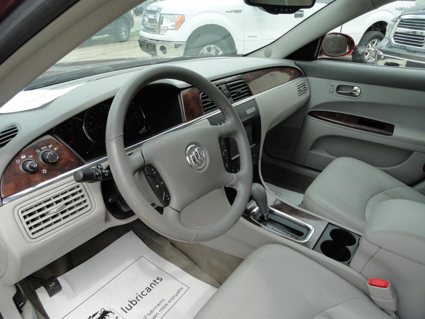 2009 Crystal Red Metallic /Greystone Buick LaCrosse CXL (2G4WD582091) with an 3.8L V6 OHV 12V engine, 4-Speed Automatic transmission, located at 827 W 26th Street, Erie, PA, 16508, (814) 455-3401, 42.105431, -80.090942 - Thanks for looking at our accident-free recent arrival. This is the CXL model with lots of options including the 3800 V6, heated leather seats, factory remote start, chrome wheels and lots more. I know this has a few miles, but it was well cared for by its previous owners as can be seen by its extra - Photo#21
