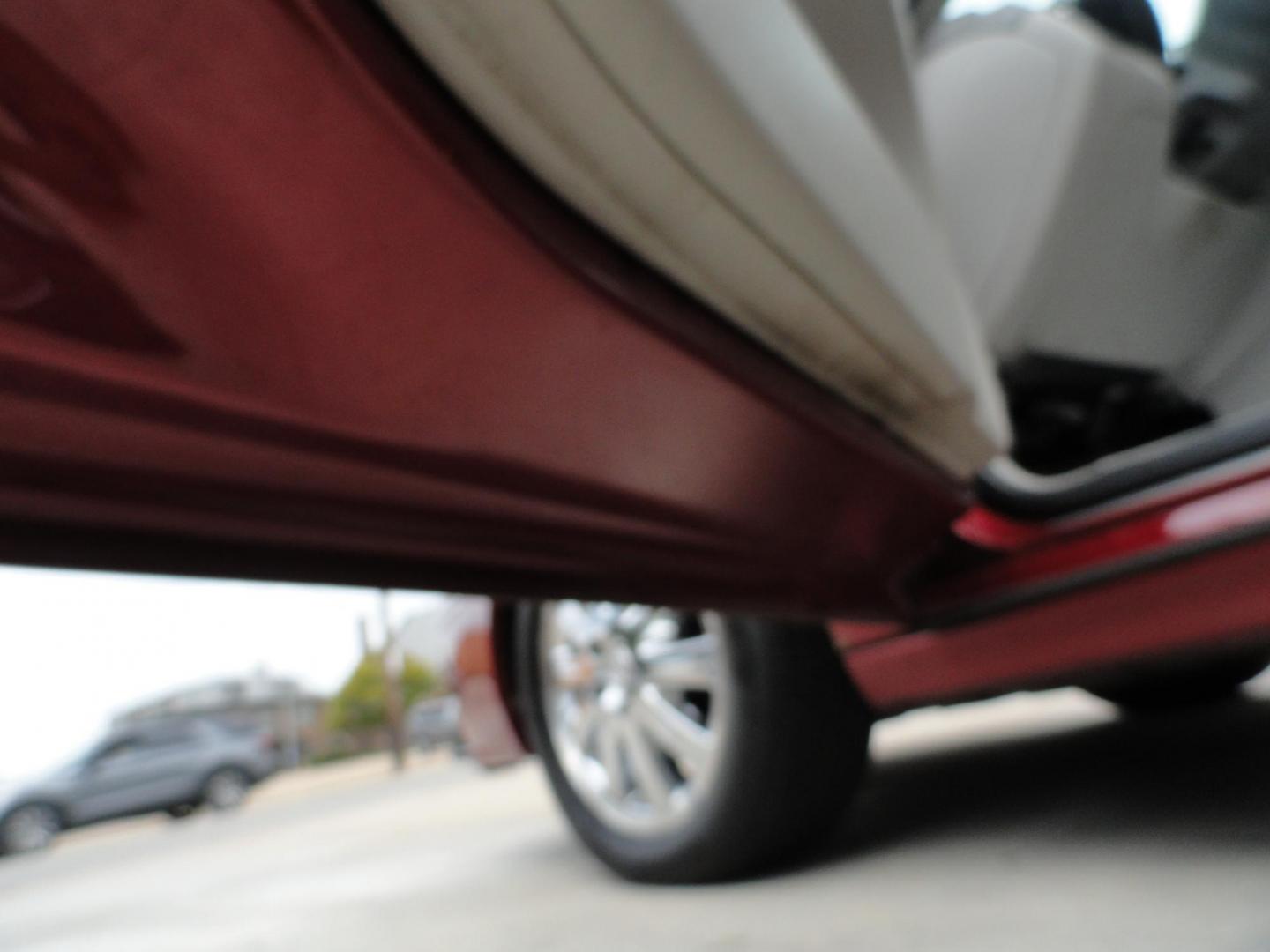 2009 Crystal Red Metallic /Greystone Buick LaCrosse CXL (2G4WD582091) with an 3.8L V6 OHV 12V engine, 4-Speed Automatic transmission, located at 827 W 26th Street, Erie, PA, 16508, (814) 455-3401, 42.105431, -80.090942 - Thanks for looking at our accident-free recent arrival. This is the CXL model with lots of options including the 3800 V6, heated leather seats, factory remote start, chrome wheels and lots more. I know this has a few miles, but it was well cared for by its previous owners as can be seen by its extra - Photo#25