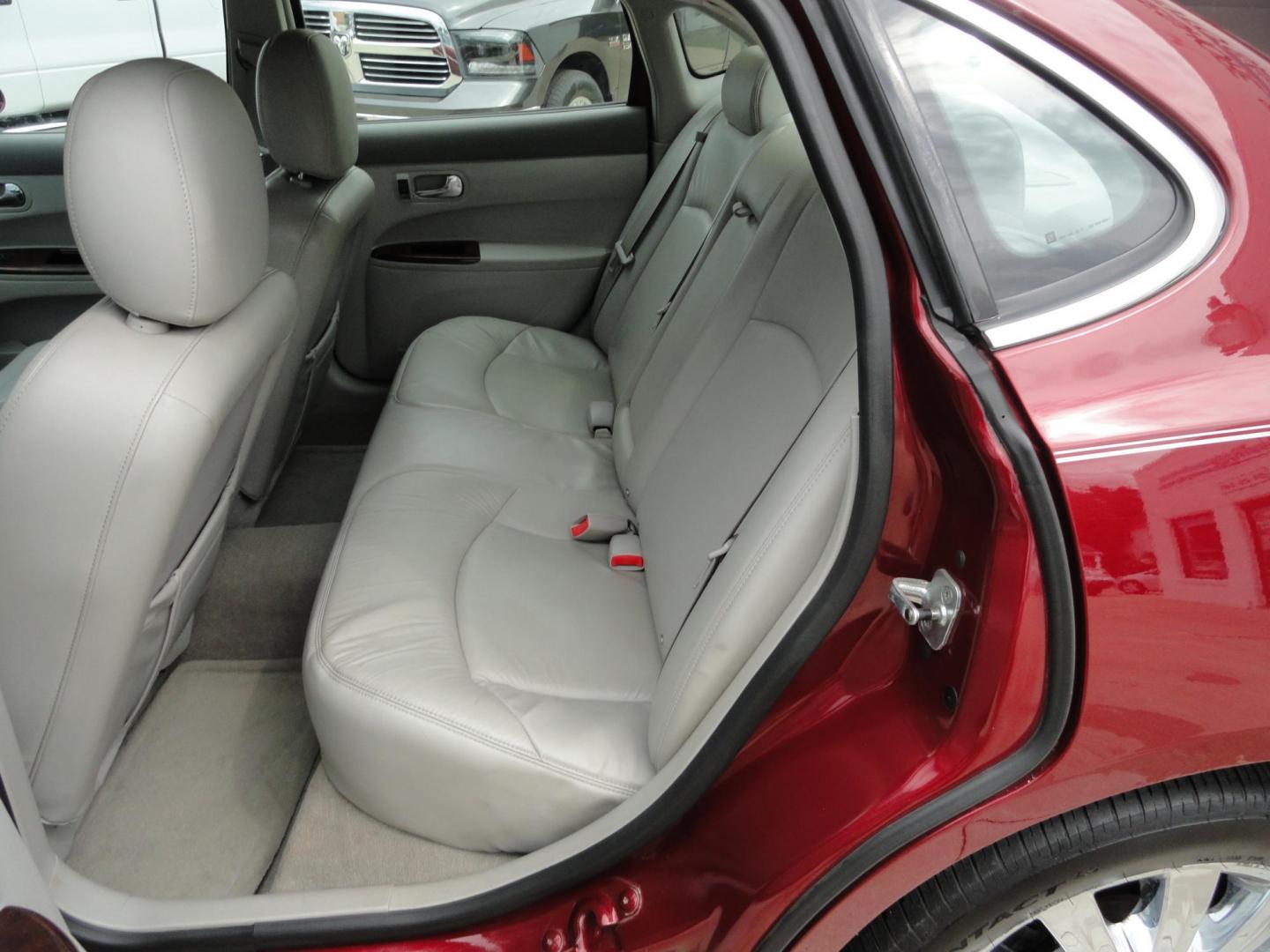 2009 Crystal Red Metallic /Greystone Buick LaCrosse CXL (2G4WD582091) with an 3.8L V6 OHV 12V engine, 4-Speed Automatic transmission, located at 827 W 26th Street, Erie, PA, 16508, (814) 455-3401, 42.105431, -80.090942 - Thanks for looking at our accident-free recent arrival. This is the CXL model with lots of options including the 3800 V6, heated leather seats, factory remote start, chrome wheels and lots more. I know this has a few miles, but it was well cared for by its previous owners as can be seen by its extra - Photo#26