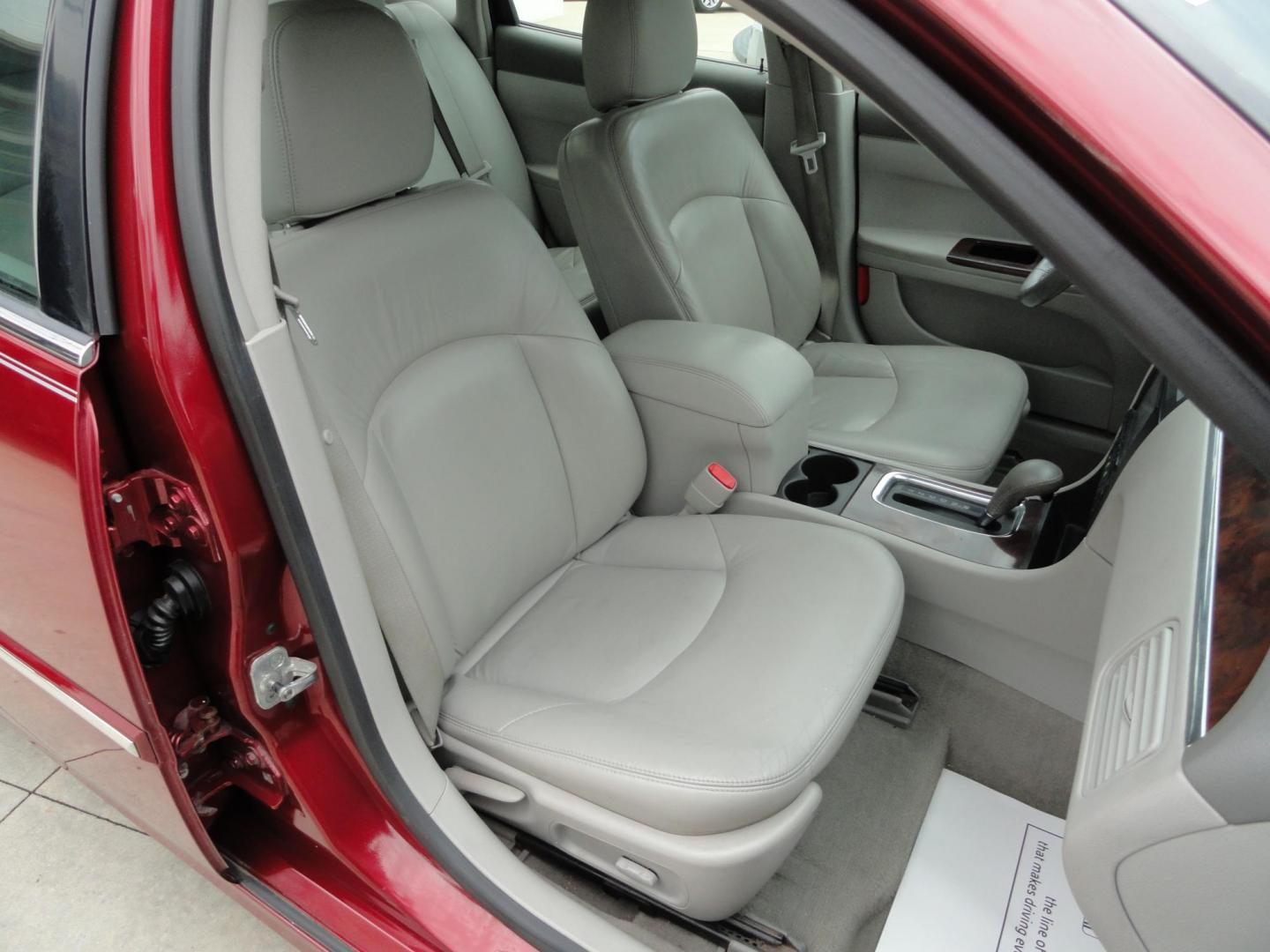 2009 Crystal Red Metallic /Greystone Buick LaCrosse CXL (2G4WD582091) with an 3.8L V6 OHV 12V engine, 4-Speed Automatic transmission, located at 827 W 26th Street, Erie, PA, 16508, (814) 455-3401, 42.105431, -80.090942 - Thanks for looking at our accident-free recent arrival. This is the CXL model with lots of options including the 3800 V6, heated leather seats, factory remote start, chrome wheels and lots more. I know this has a few miles, but it was well cared for by its previous owners as can be seen by its extra - Photo#34