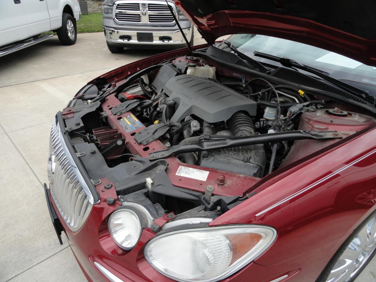 2009 Crystal Red Metallic /Greystone Buick LaCrosse CXL (2G4WD582091) with an 3.8L V6 OHV 12V engine, 4-Speed Automatic transmission, located at 827 W 26th Street, Erie, PA, 16508, (814) 455-3401, 42.105431, -80.090942 - Thanks for looking at our accident-free recent arrival. This is the CXL model with lots of options including the 3800 V6, heated leather seats, factory remote start, chrome wheels and lots more. I know this has a few miles, but it was well cared for by its previous owners as can be seen by its extra - Photo#37