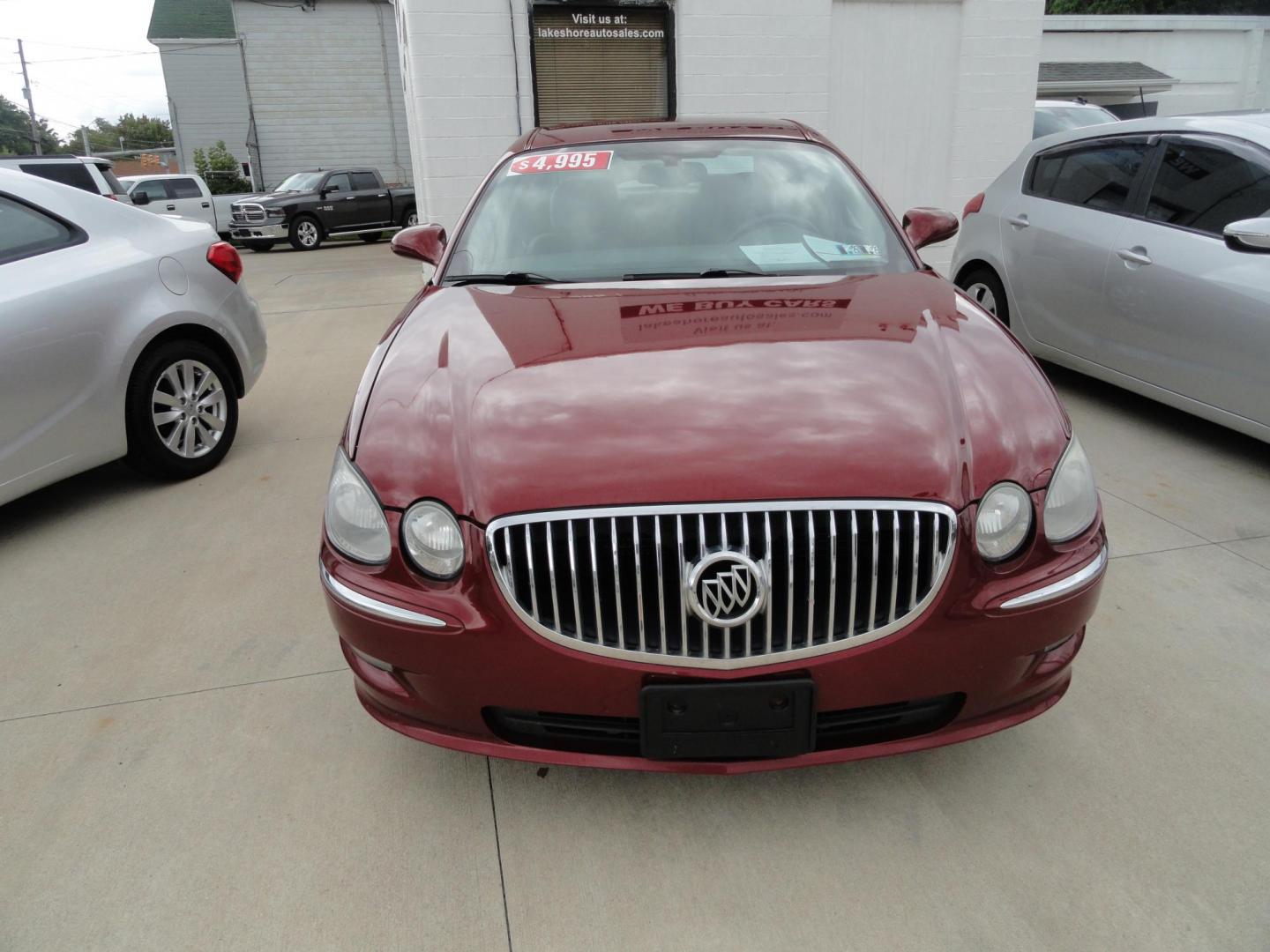 2009 Crystal Red Metallic /Greystone Buick LaCrosse CXL (2G4WD582091) with an 3.8L V6 OHV 12V engine, 4-Speed Automatic transmission, located at 827 W 26th Street, Erie, PA, 16508, (814) 455-3401, 42.105431, -80.090942 - Thanks for looking at our accident-free recent arrival. This is the CXL model with lots of options including the 3800 V6, heated leather seats, factory remote start, chrome wheels and lots more. I know this has a few miles, but it was well cared for by its previous owners as can be seen by its extra - Photo#1