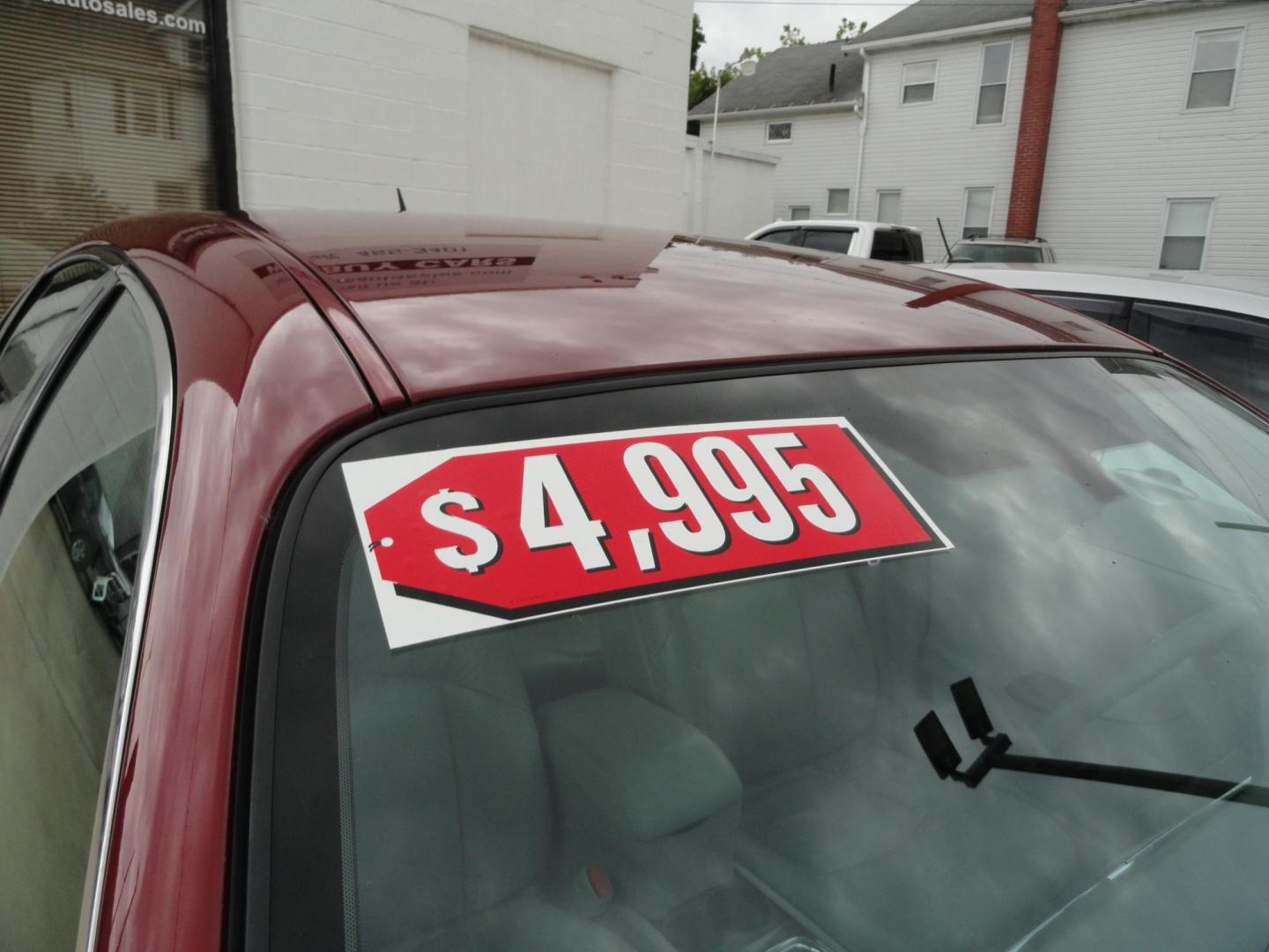 2009 Crystal Red Metallic /Greystone Buick LaCrosse CXL (2G4WD582091) with an 3.8L V6 OHV 12V engine, 4-Speed Automatic transmission, located at 827 W 26th Street, Erie, PA, 16508, (814) 455-3401, 42.105431, -80.090942 - Thanks for looking at our accident-free recent arrival. This is the CXL model with lots of options including the 3800 V6, heated leather seats, factory remote start, chrome wheels and lots more. I know this has a few miles, but it was well cared for by its previous owners as can be seen by its extra - Photo#2