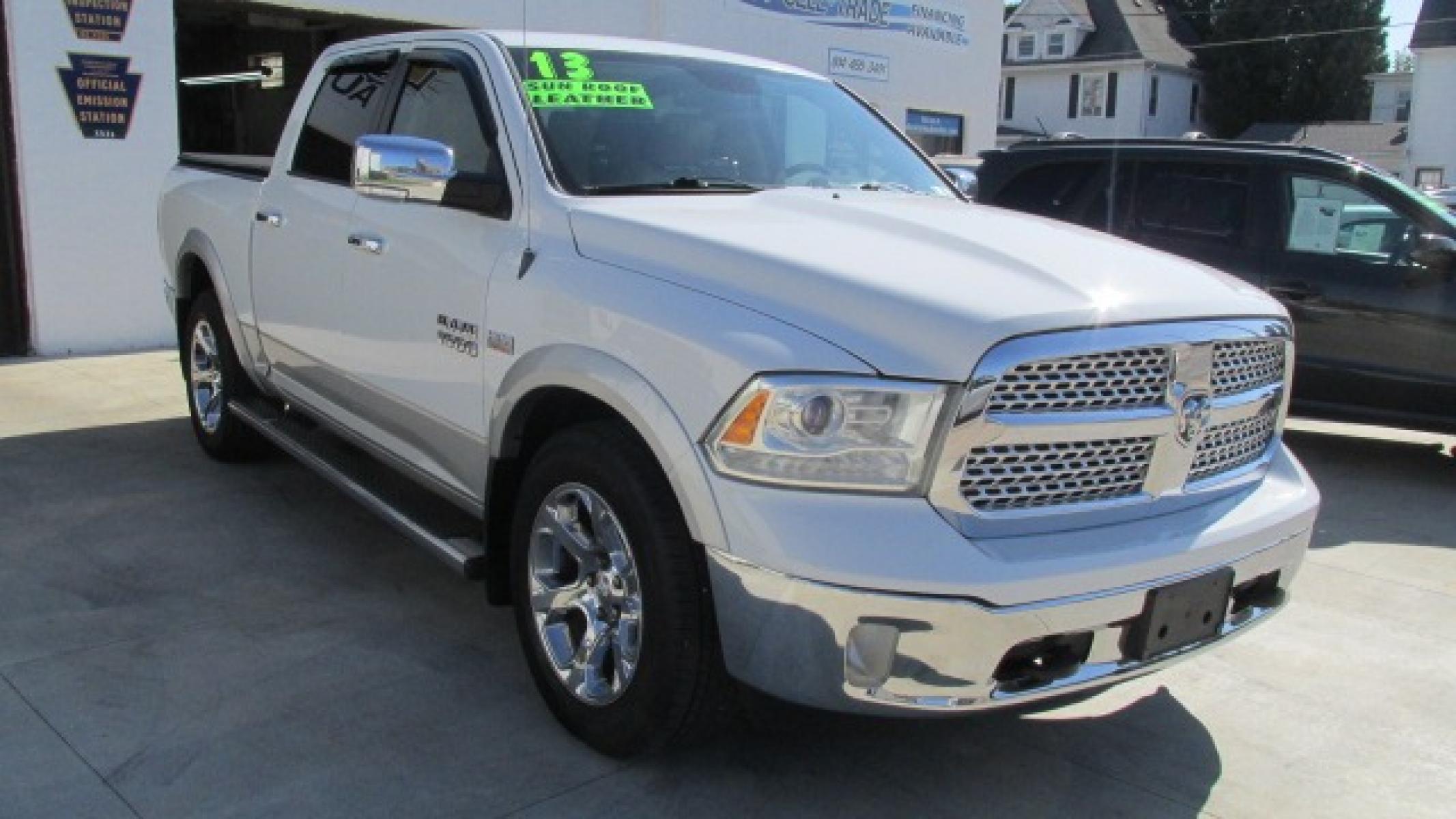 2013 Bright White Clearcoat /Tan Ram 1500 Laramie Laramie (1C6RR7NT4DS) with an 5.7L V8 OHV 16V engine, 6-Speed Automatic transmission, located at 827 W 26th Street, Erie, PA, 16508, (814) 455-3401, 42.105431, -80.090942 - Thanks for looking at our own one owner like new hard to find truck in this condition. Yes, this truck has a few miles but take a minute to read the following description. This truck was purchased by our owner back in November of 2017 from Texas where it spent its time from new. In the six years th - Photo #0