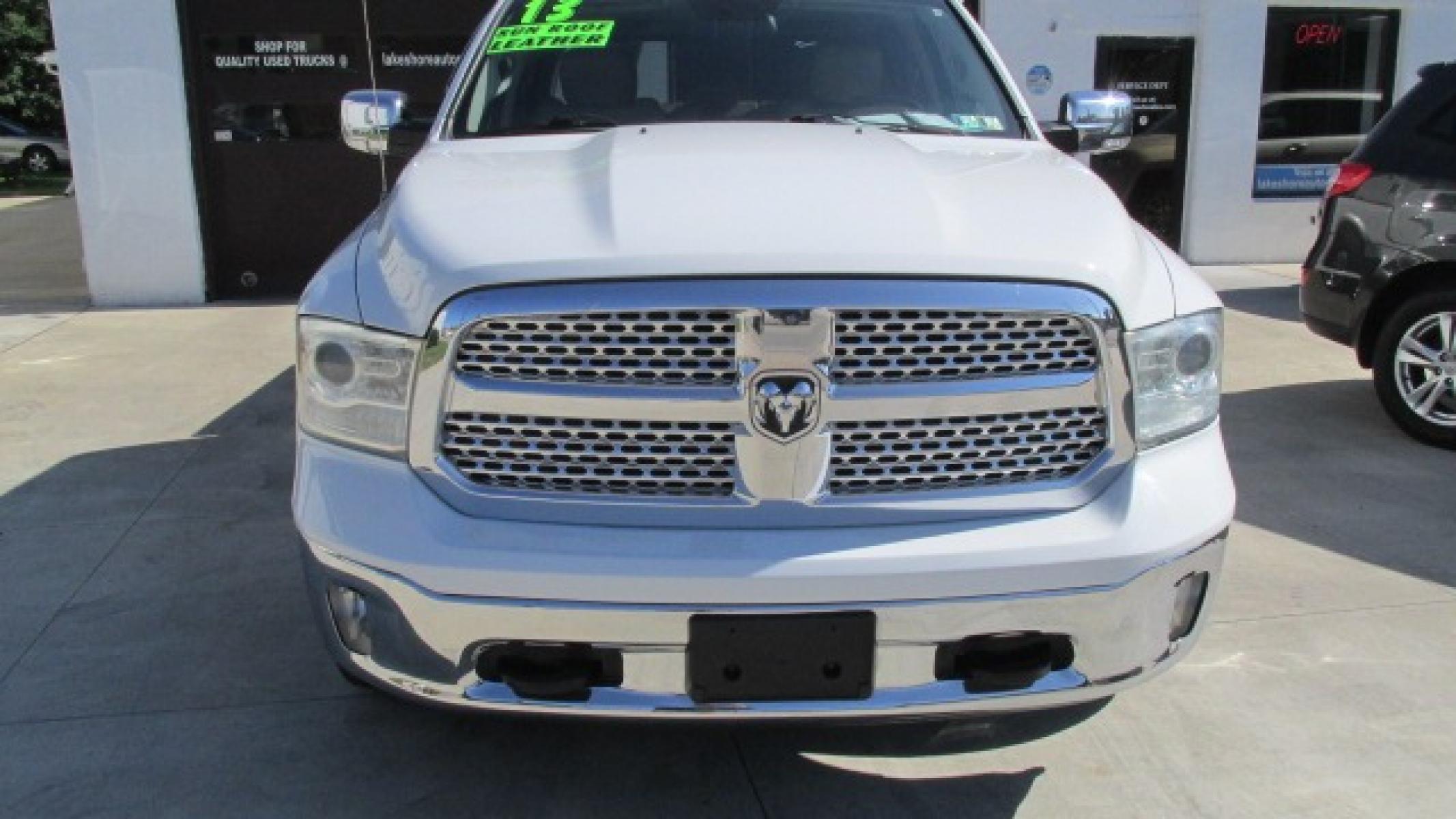 2013 Bright White Clearcoat /Tan Ram 1500 Laramie Laramie (1C6RR7NT4DS) with an 5.7L V8 OHV 16V engine, 6-Speed Automatic transmission, located at 827 W 26th Street, Erie, PA, 16508, (814) 455-3401, 42.105431, -80.090942 - Thanks for looking at our own one owner like new hard to find truck in this condition. Yes, this truck has a few miles but take a minute to read the following description. This truck was purchased by our owner back in November of 2017 from Texas where it spent its time from new. In the six years th - Photo #1