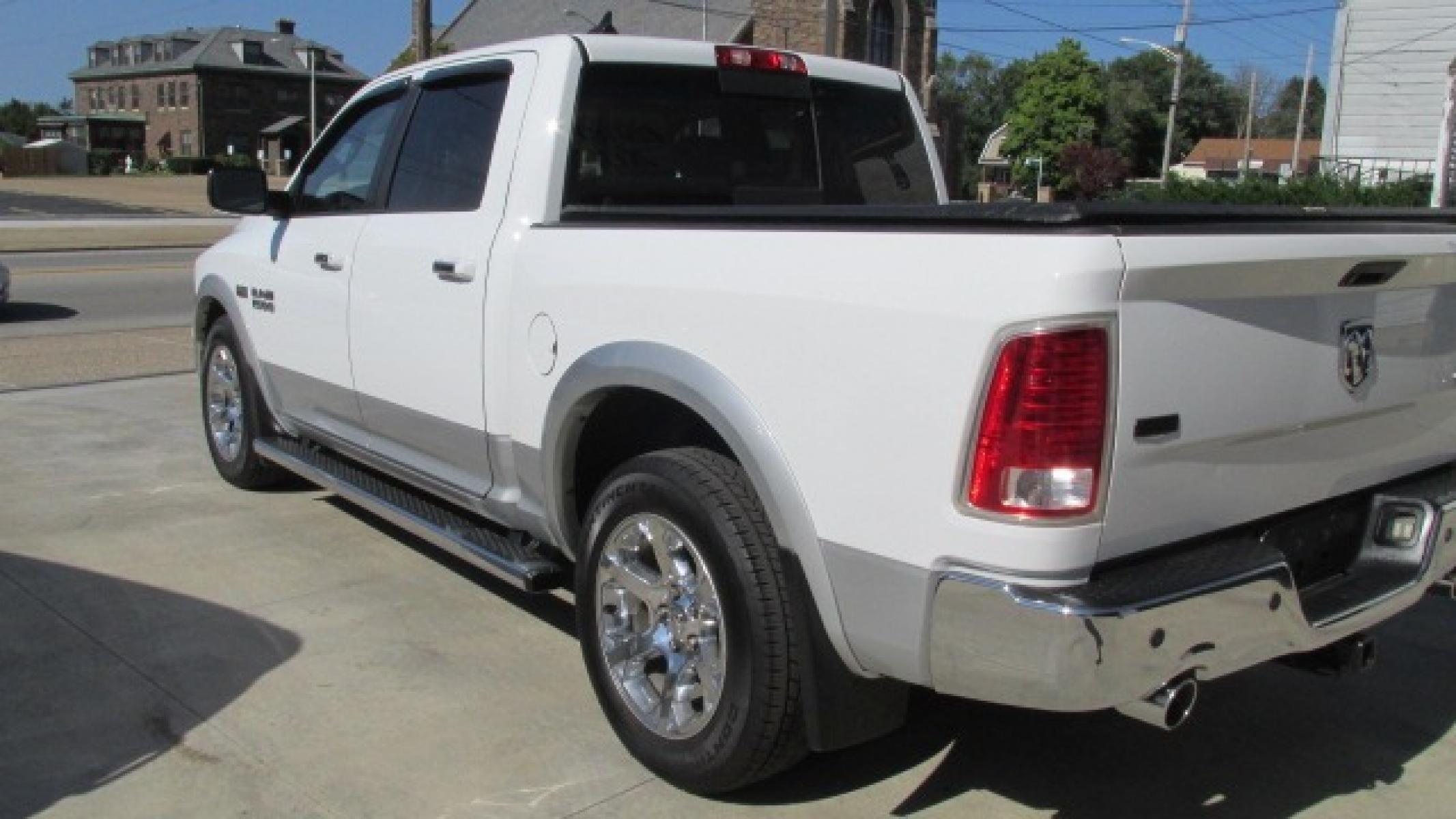 2013 Bright White Clearcoat /Tan Ram 1500 Laramie Laramie (1C6RR7NT4DS) with an 5.7L V8 OHV 16V engine, 6-Speed Automatic transmission, located at 827 W 26th Street, Erie, PA, 16508, (814) 455-3401, 42.105431, -80.090942 - Thanks for looking at our own one owner like new hard to find truck in this condition. Yes, this truck has a few miles but take a minute to read the following description. This truck was purchased by our owner back in November of 2017 from Texas where it spent its time from new. In the six years th - Photo #5