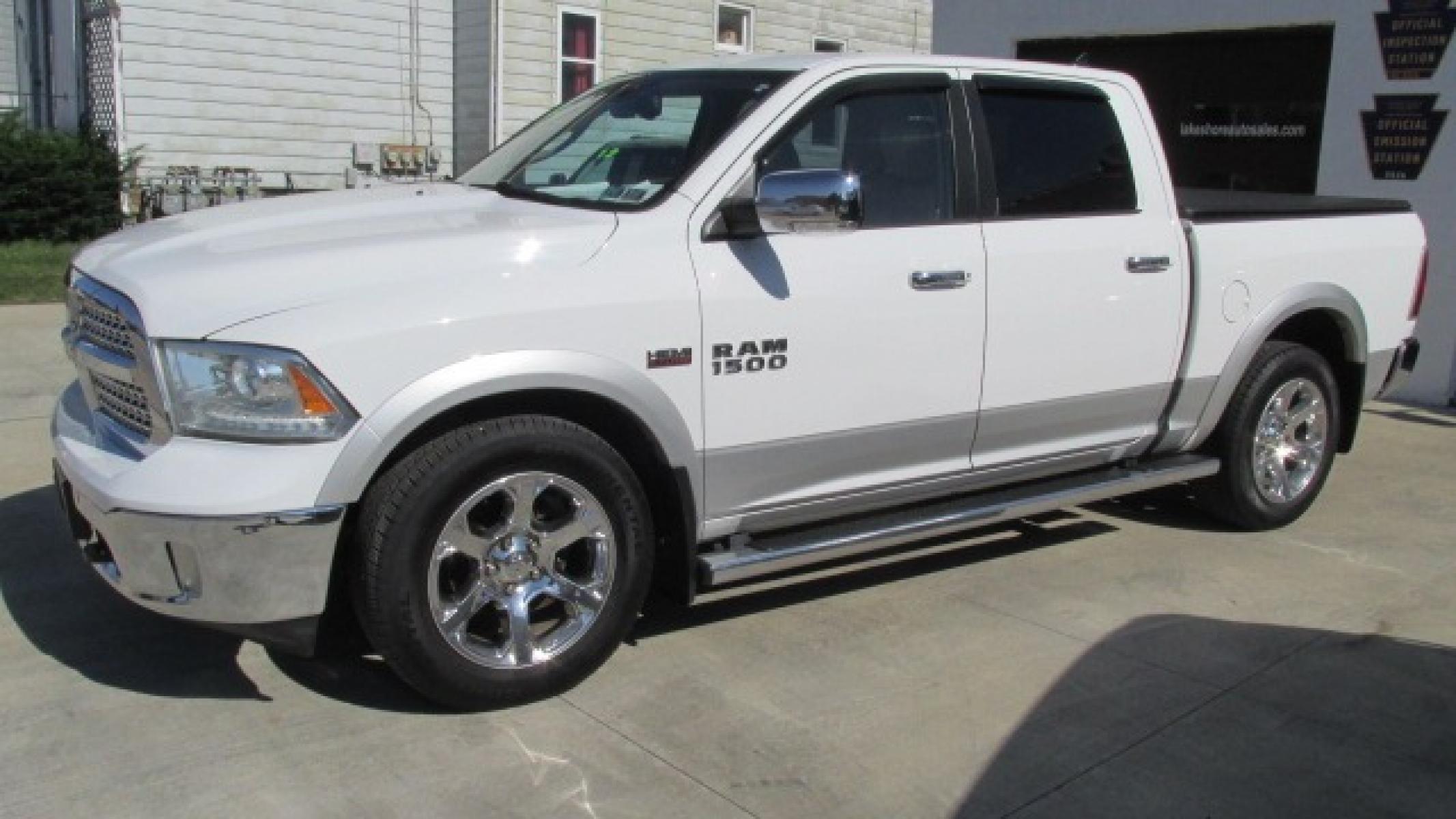 2013 Bright White Clearcoat /Tan Ram 1500 Laramie Laramie (1C6RR7NT4DS) with an 5.7L V8 OHV 16V engine, 6-Speed Automatic transmission, located at 827 W 26th Street, Erie, PA, 16508, (814) 455-3401, 42.105431, -80.090942 - Thanks for looking at our own one owner like new hard to find truck in this condition. Yes, this truck has a few miles but take a minute to read the following description. This truck was purchased by our owner back in November of 2017 from Texas where it spent its time from new. In the six years th - Photo #6