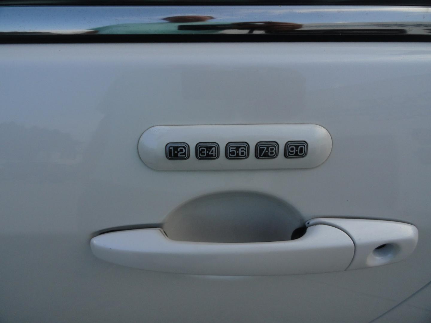 2012 White Platinum Tricoat /Jet Black Ford Fusion SPORT (3FAHP0KC4CR) with an 3.5L V6 DOHC 24V engine, 4-Speed Automatic Overdrive transmission, located at 827 W 26th Street, Erie, PA, 16508, (814) 455-3401, 42.105431, -80.090942 - Thanks for looking at our super clean rust and accident-free trade in. We sold this vehicle a few years ago and just took it back in on trade, and it's in the best condition I've seen in years with a rust-free exterior as well as a like new interior. This is the Sport model with the V-6 motor, dual- Photo#8
