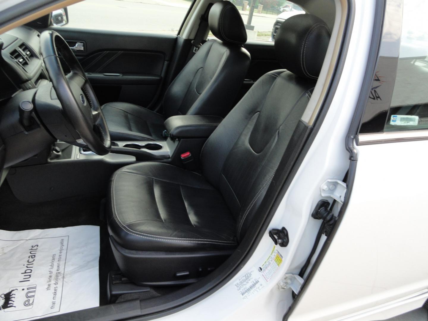 2012 White Platinum Tricoat /Jet Black Ford Fusion SPORT (3FAHP0KC4CR) with an 3.5L V6 DOHC 24V engine, 4-Speed Automatic Overdrive transmission, located at 827 W 26th Street, Erie, PA, 16508, (814) 455-3401, 42.105431, -80.090942 - Thanks for looking at our super clean rust and accident-free trade in. We sold this vehicle a few years ago and just took it back in on trade, and it's in the best condition I've seen in years with a rust-free exterior as well as a like new interior. This is the Sport model with the V-6 motor, dual- Photo#22