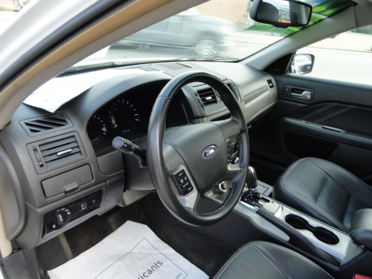 2012 White Platinum Tricoat /Jet Black Ford Fusion SPORT (3FAHP0KC4CR) with an 3.5L V6 DOHC 24V engine, 4-Speed Automatic Overdrive transmission, located at 827 W 26th Street, Erie, PA, 16508, (814) 455-3401, 42.105431, -80.090942 - Thanks for looking at our super clean rust and accident-free trade in. We sold this vehicle a few years ago and just took it back in on trade, and it's in the best condition I've seen in years with a rust-free exterior as well as a like new interior. This is the Sport model with the V-6 motor, dual- Photo#21