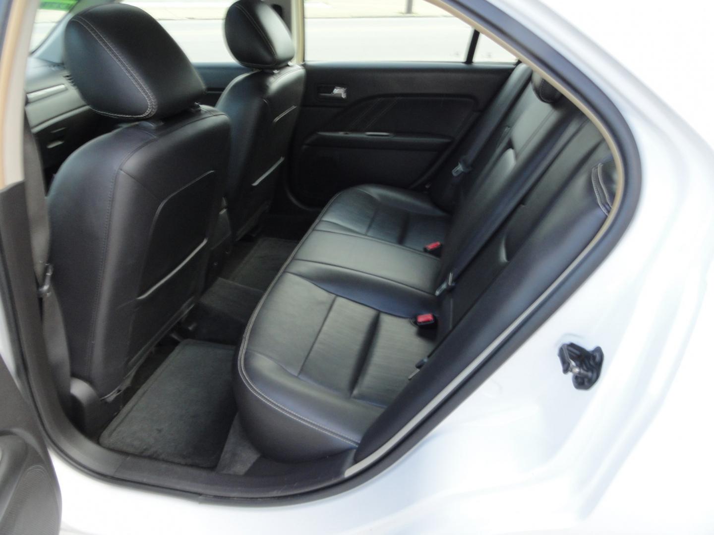 2012 White Platinum Tricoat /Jet Black Ford Fusion SPORT (3FAHP0KC4CR) with an 3.5L V6 DOHC 24V engine, 4-Speed Automatic Overdrive transmission, located at 827 W 26th Street, Erie, PA, 16508, (814) 455-3401, 42.105431, -80.090942 - Thanks for looking at our super clean rust and accident-free trade in. We sold this vehicle a few years ago and just took it back in on trade, and it's in the best condition I've seen in years with a rust-free exterior as well as a like new interior. This is the Sport model with the V-6 motor, dual- Photo#26