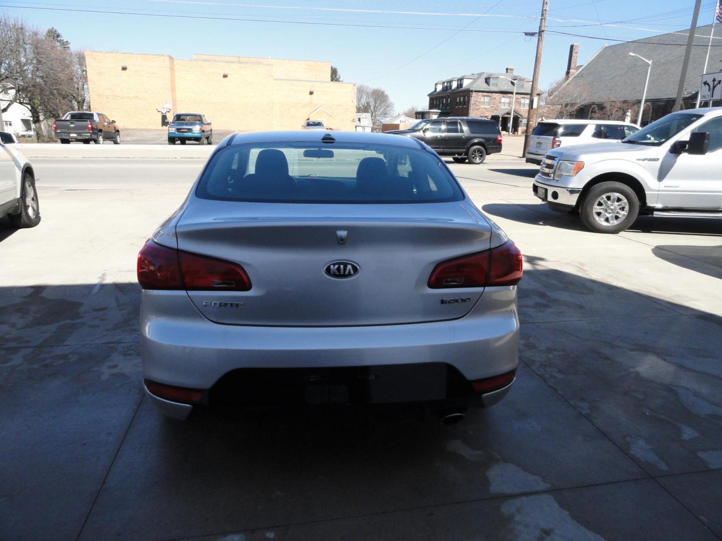2014 Bright Silver /Graphite Kia Forte Koup EX (KNAFX6A80E5) with an 2.0L L4 DOHC 16V engine, 6-Speed Automatic transmission, located at 827 W 26th Street, Erie, PA, 16508, (814) 455-3401, 42.105431, -80.090942 - Photo#4