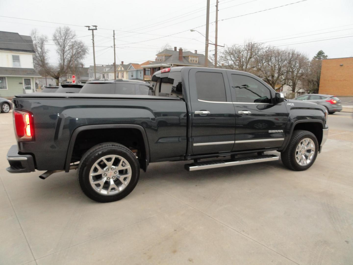 2017 Dark Slate Metallic /Graphite GMC Sierra 1500 SLT (1GTV2NEC4HZ) with an 5.3L V8 OHV 16V engine, 8-Speed Automatic transmission, located at 827 W 26th Street, Erie, PA, 16508, (814) 455-3401, 42.105431, -80.090942 - Thanks for looking at our accident free like new GMC trade in. Please be advised that we sold this truck two months ago and the buyer traded it back in to us on a GMC Denali which is what he originally wanted and also be advised that these are two month old pictures and the current mileage is 99301. - Photo#3