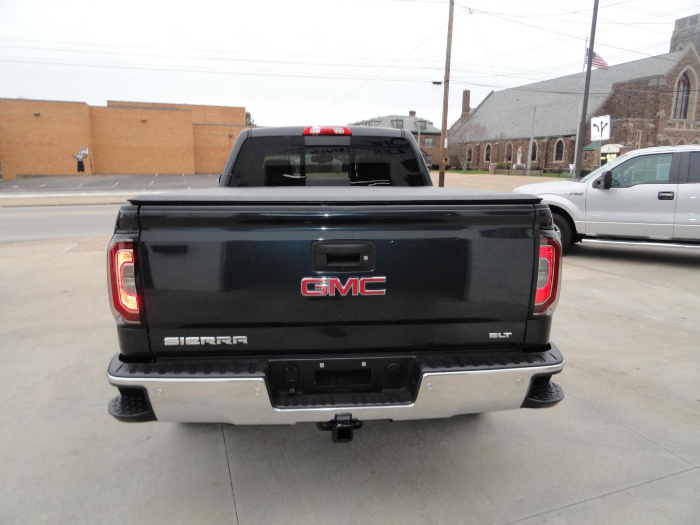 2017 Dark Slate Metallic /Graphite GMC Sierra 1500 SLT (1GTV2NEC4HZ) with an 5.3L V8 OHV 16V engine, 8-Speed Automatic transmission, located at 827 W 26th Street, Erie, PA, 16508, (814) 455-3401, 42.105431, -80.090942 - Thanks for looking at our accident free like new GMC trade in. Please be advised that we sold this truck two months ago and the buyer traded it back in to us on a GMC Denali which is what he originally wanted and also be advised that these are two month old pictures and the current mileage is 99301. - Photo#4