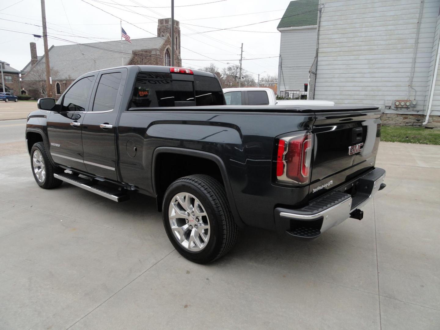 2017 Dark Slate Metallic /Graphite GMC Sierra 1500 SLT (1GTV2NEC4HZ) with an 5.3L V8 OHV 16V engine, 8-Speed Automatic transmission, located at 827 W 26th Street, Erie, PA, 16508, (814) 455-3401, 42.105431, -80.090942 - Thanks for looking at our accident free like new GMC trade in. Please be advised that we sold this truck two months ago and the buyer traded it back in to us on a GMC Denali which is what he originally wanted and also be advised that these are two month old pictures and the current mileage is 99301. - Photo#5