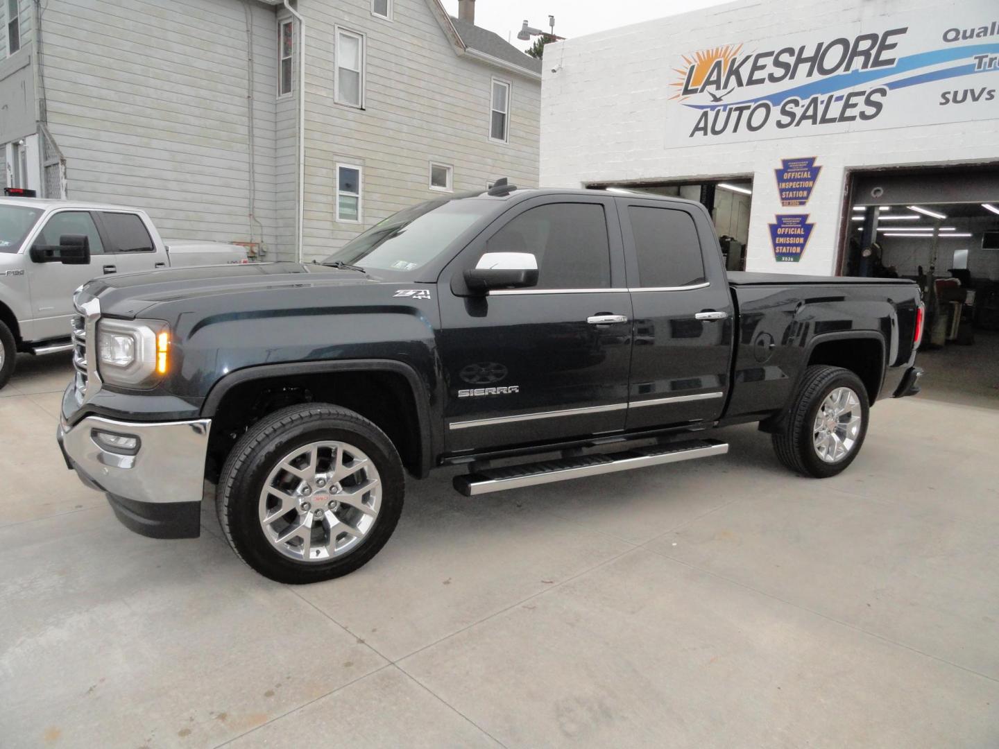 2017 Dark Slate Metallic /Graphite GMC Sierra 1500 SLT (1GTV2NEC4HZ) with an 5.3L V8 OHV 16V engine, 8-Speed Automatic transmission, located at 827 W 26th Street, Erie, PA, 16508, (814) 455-3401, 42.105431, -80.090942 - Thanks for looking at our accident free like new GMC trade in. Please be advised that we sold this truck two months ago and the buyer traded it back in to us on a GMC Denali which is what he originally wanted and also be advised that these are two month old pictures and the current mileage is 99301. - Photo#6