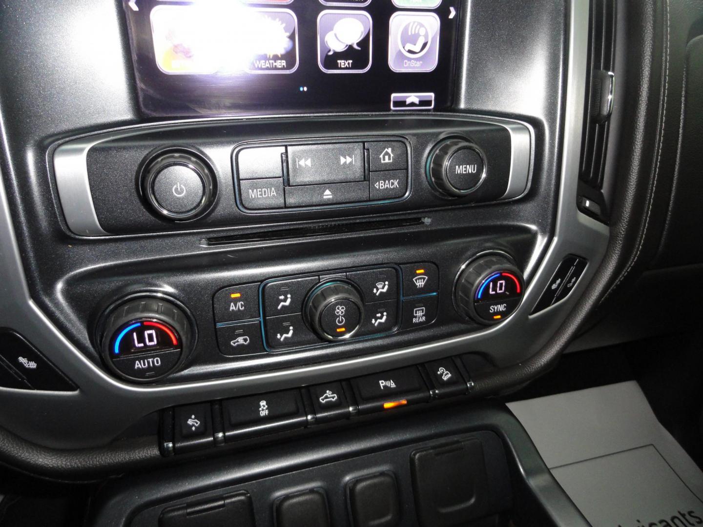 2017 Dark Slate Metallic /Graphite GMC Sierra 1500 SLT (1GTV2NEC4HZ) with an 5.3L V8 OHV 16V engine, 8-Speed Automatic transmission, located at 827 W 26th Street, Erie, PA, 16508, (814) 455-3401, 42.105431, -80.090942 - Thanks for looking at our accident free like new GMC trade in. Please be advised that we sold this truck two months ago and the buyer traded it back in to us on a GMC Denali which is what he originally wanted and also be advised that these are two month old pictures and the current mileage is 99301. - Photo#14