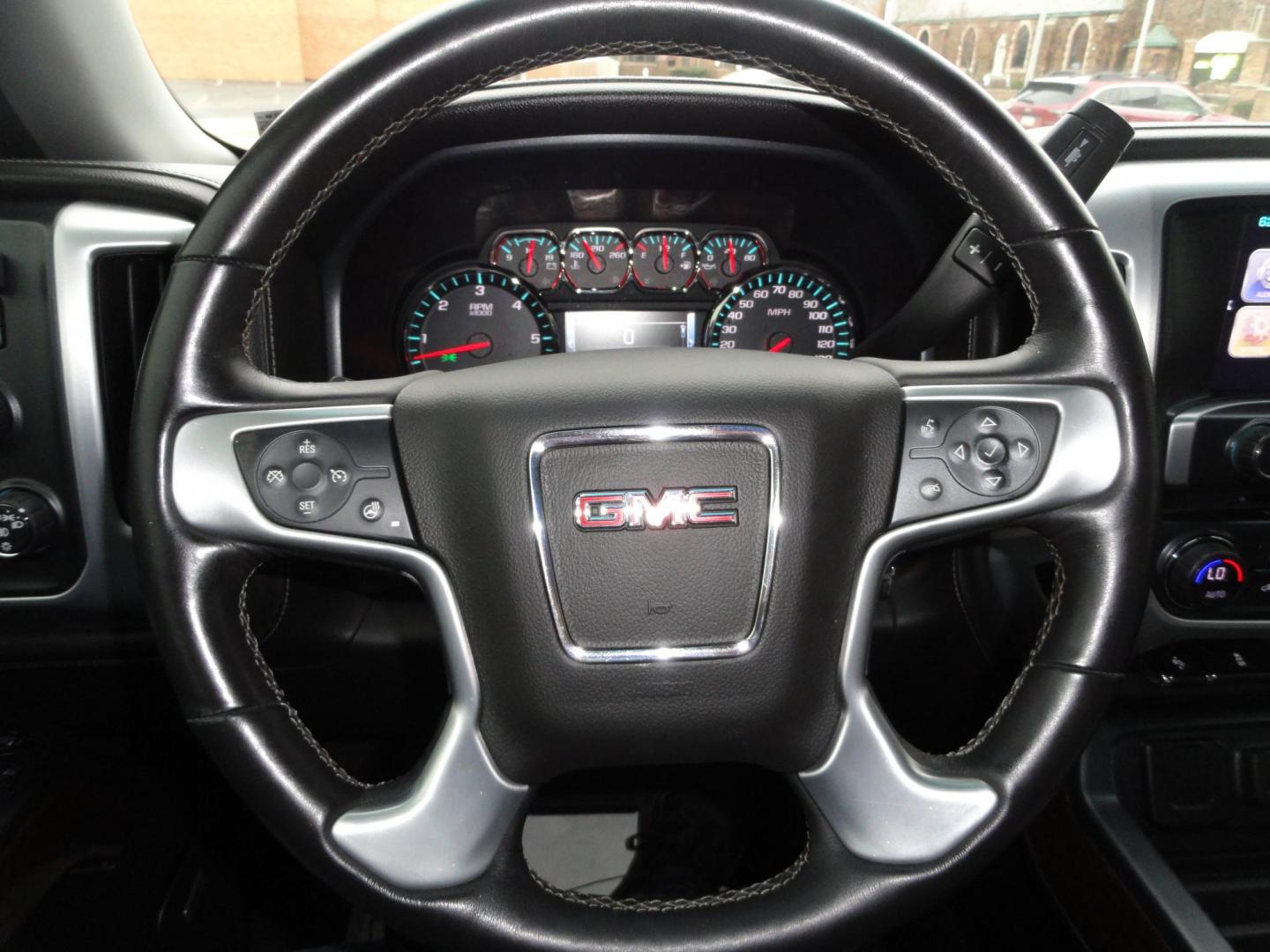 2017 Dark Slate Metallic /Graphite GMC Sierra 1500 SLT (1GTV2NEC4HZ) with an 5.3L V8 OHV 16V engine, 8-Speed Automatic transmission, located at 827 W 26th Street, Erie, PA, 16508, (814) 455-3401, 42.105431, -80.090942 - Thanks for looking at our accident free like new GMC trade in. Please be advised that we sold this truck two months ago and the buyer traded it back in to us on a GMC Denali which is what he originally wanted and also be advised that these are two month old pictures and the current mileage is 99301. - Photo#18