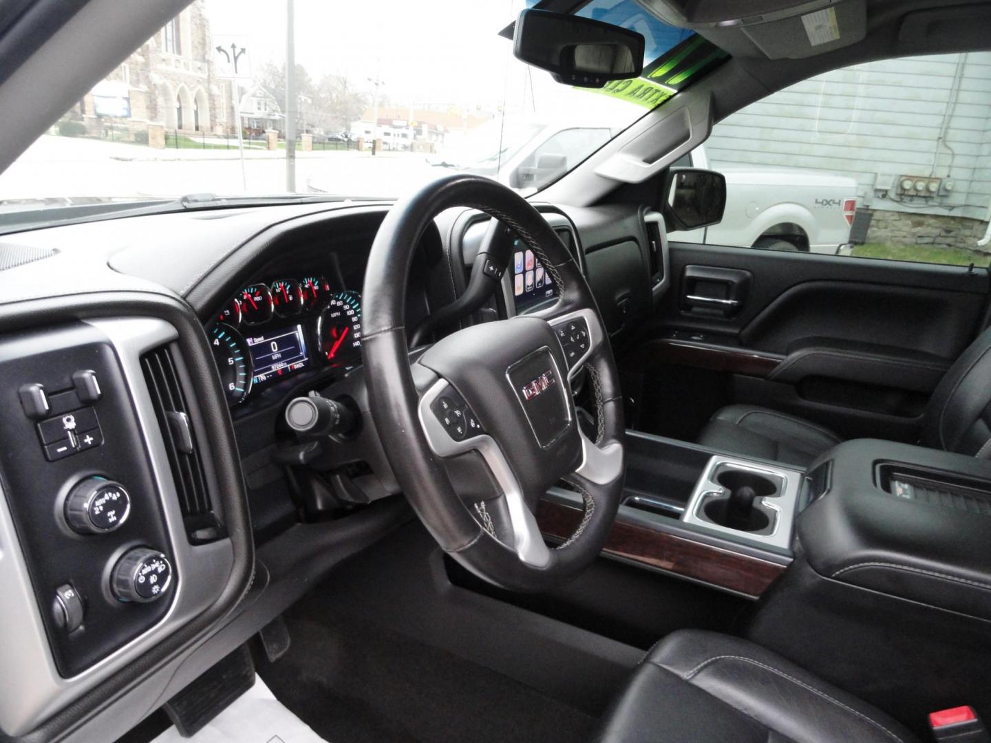 2017 Dark Slate Metallic /Graphite GMC Sierra 1500 SLT (1GTV2NEC4HZ) with an 5.3L V8 OHV 16V engine, 8-Speed Automatic transmission, located at 827 W 26th Street, Erie, PA, 16508, (814) 455-3401, 42.105431, -80.090942 - Thanks for looking at our accident free like new GMC trade in. Please be advised that we sold this truck two months ago and the buyer traded it back in to us on a GMC Denali which is what he originally wanted and also be advised that these are two month old pictures and the current mileage is 99301. - Photo#30