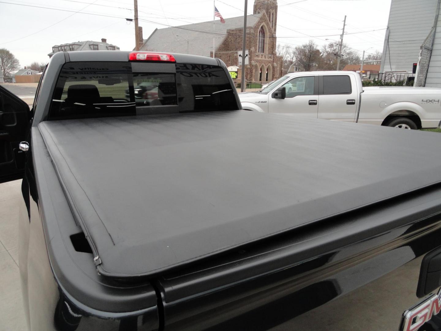 2017 Dark Slate Metallic /Graphite GMC Sierra 1500 SLT (1GTV2NEC4HZ) with an 5.3L V8 OHV 16V engine, 8-Speed Automatic transmission, located at 827 W 26th Street, Erie, PA, 16508, (814) 455-3401, 42.105431, -80.090942 - Thanks for looking at our accident free like new GMC trade in. Please be advised that we sold this truck two months ago and the buyer traded it back in to us on a GMC Denali which is what he originally wanted and also be advised that these are two month old pictures and the current mileage is 99301. - Photo#38