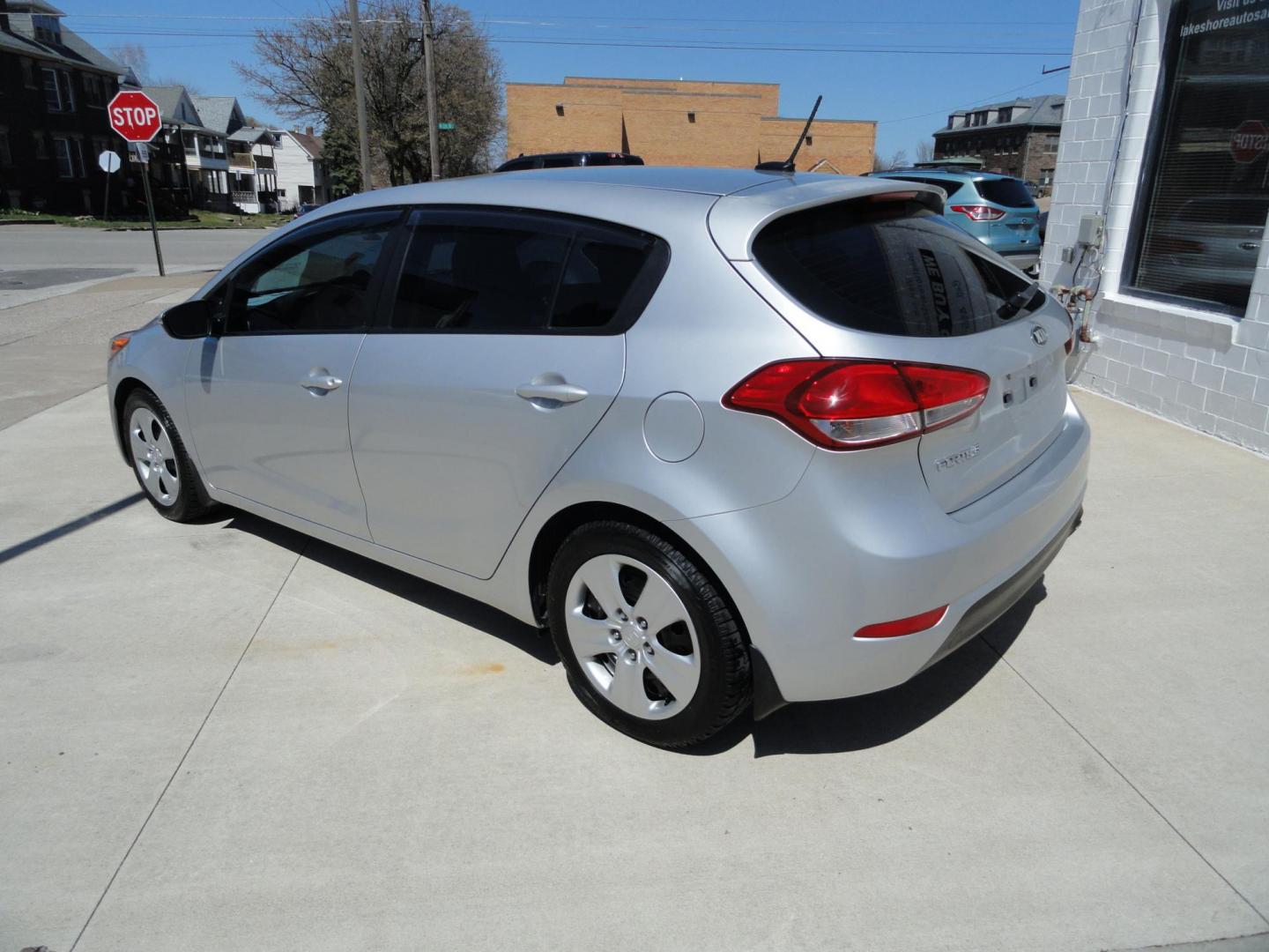 2016 Silky Silver Metallic /Greystone Kia Forte 5-Door LX (KNAFK5A81G5) with an 2.0L L4 DOHC 16V engine, 6-Speed Automatic transmission, located at 827 W 26th Street, Erie, PA, 16508, (814) 455-3401, 42.105431, -80.090942 - Thanks for looking at our one owner accident and rust-free new Ford trade. This is the LX model with lots of options and it comes with like new exterior plus a nonsmoker interior. A recent Pa state and emissions inspection, lube oil and filter change were just completed in our service department. Hu - Photo#5