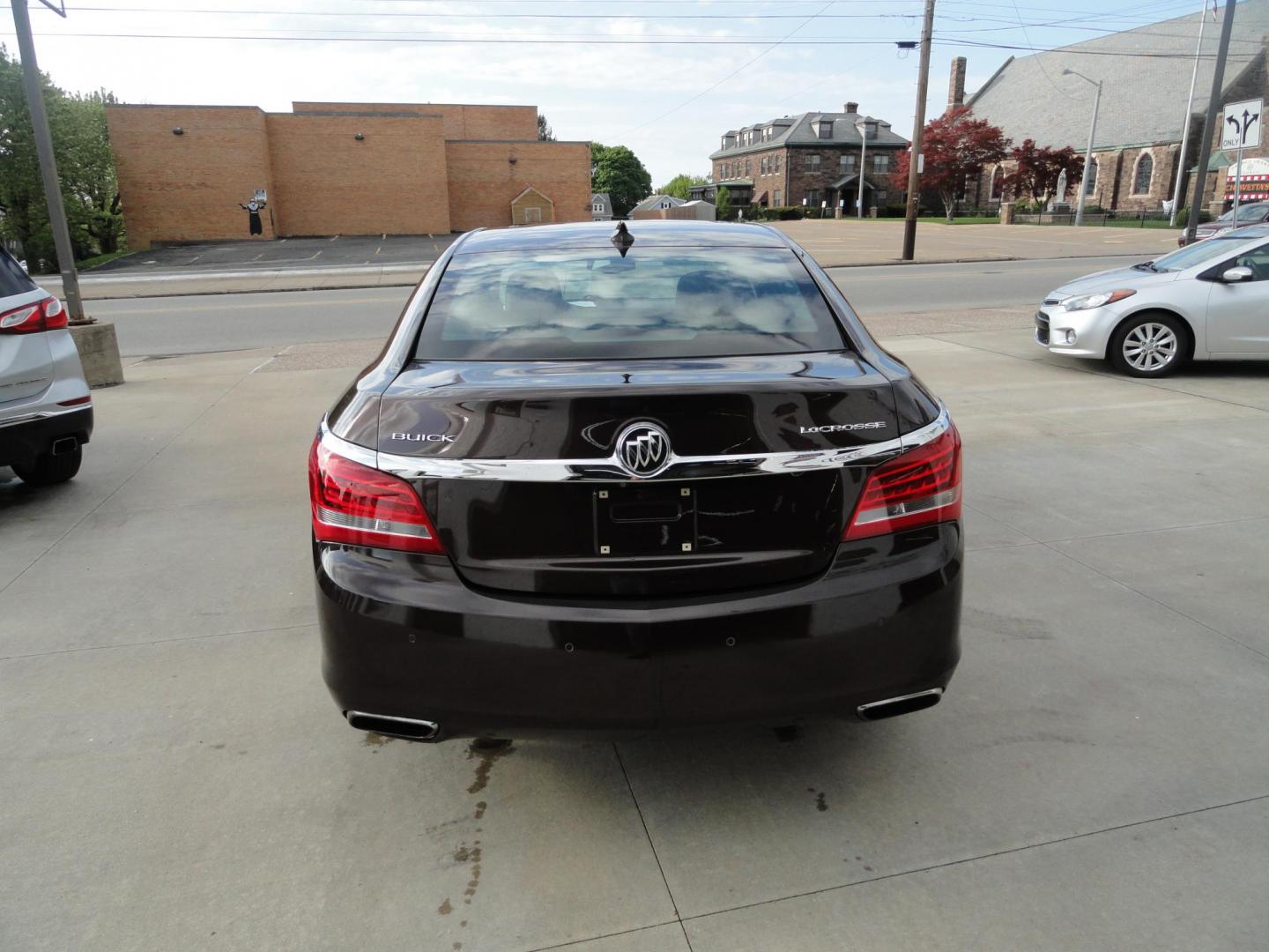 2016 Burnished Brandy Metallic /Coco/Dune Buick LaCrosse Leather Package (1G4GB5G35GF) with an 3.6L V6 DOHC 24V FFV engine, 6 Speed automatic transmission, located at 827 W 26th Street, Erie, PA, 16508, (814) 455-3401, 42.105431, -80.090942 - Thanks for looking at our two-owner accident and rust-free recent arrival. This is the Leather Package trim level with Driver confidence package which includes adaptive HID headlamps, front collision alert, blind spot monitoring, rear cross-traffic alert, foglamps and a heads-up display. This vehicl - Photo#4