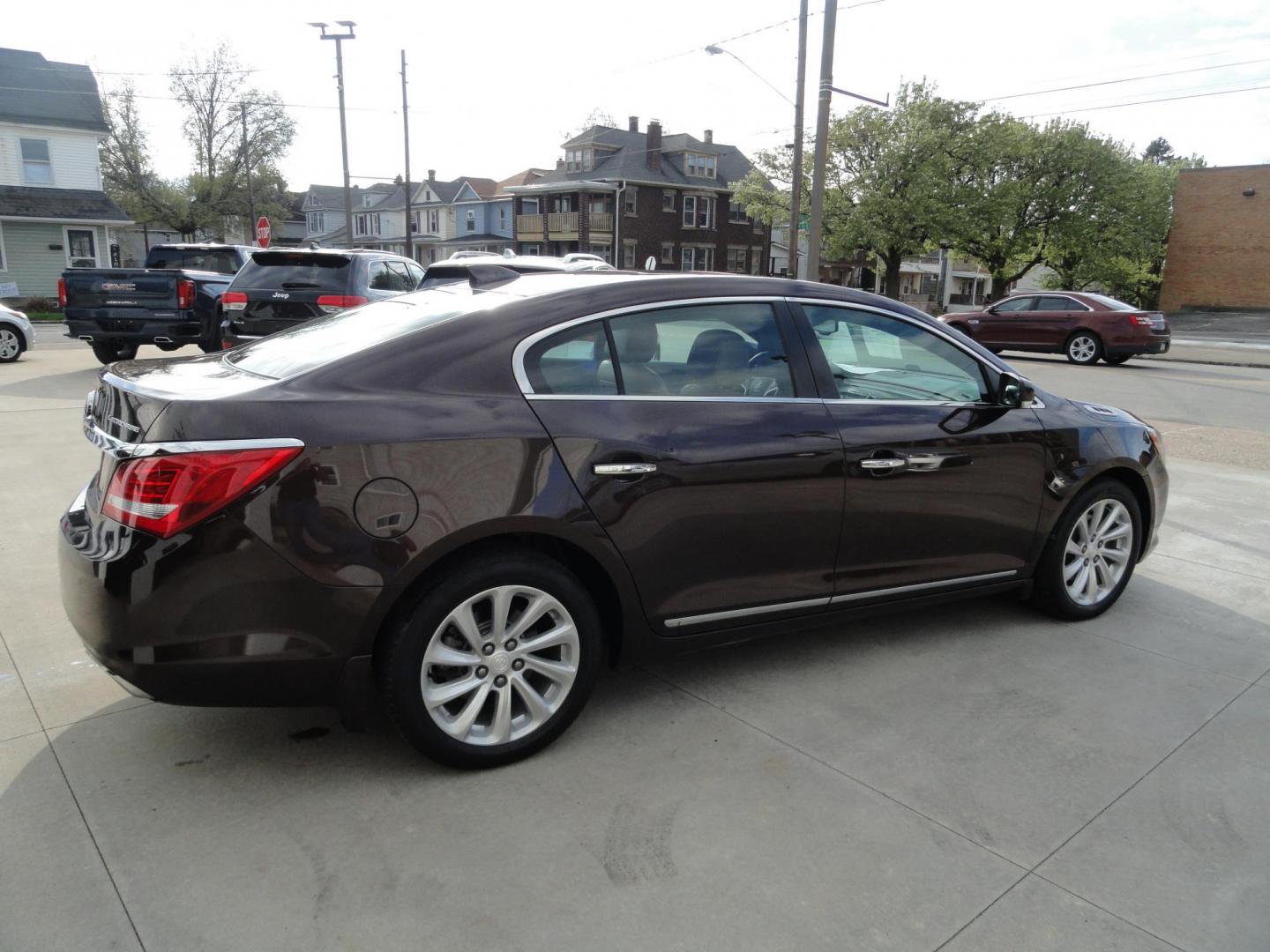 2016 Burnished Brandy Metallic /Coco/Dune Buick LaCrosse Leather Package (1G4GB5G35GF) with an 3.6L V6 DOHC 24V FFV engine, 6 Speed automatic transmission, located at 827 W 26th Street, Erie, PA, 16508, (814) 455-3401, 42.105431, -80.090942 - Thanks for looking at our two-owner accident and rust-free recent arrival. This is the Leather Package trim level with Driver confidence package which includes adaptive HID headlamps, front collision alert, blind spot monitoring, rear cross-traffic alert, foglamps and a heads-up display. This vehicl - Photo#3