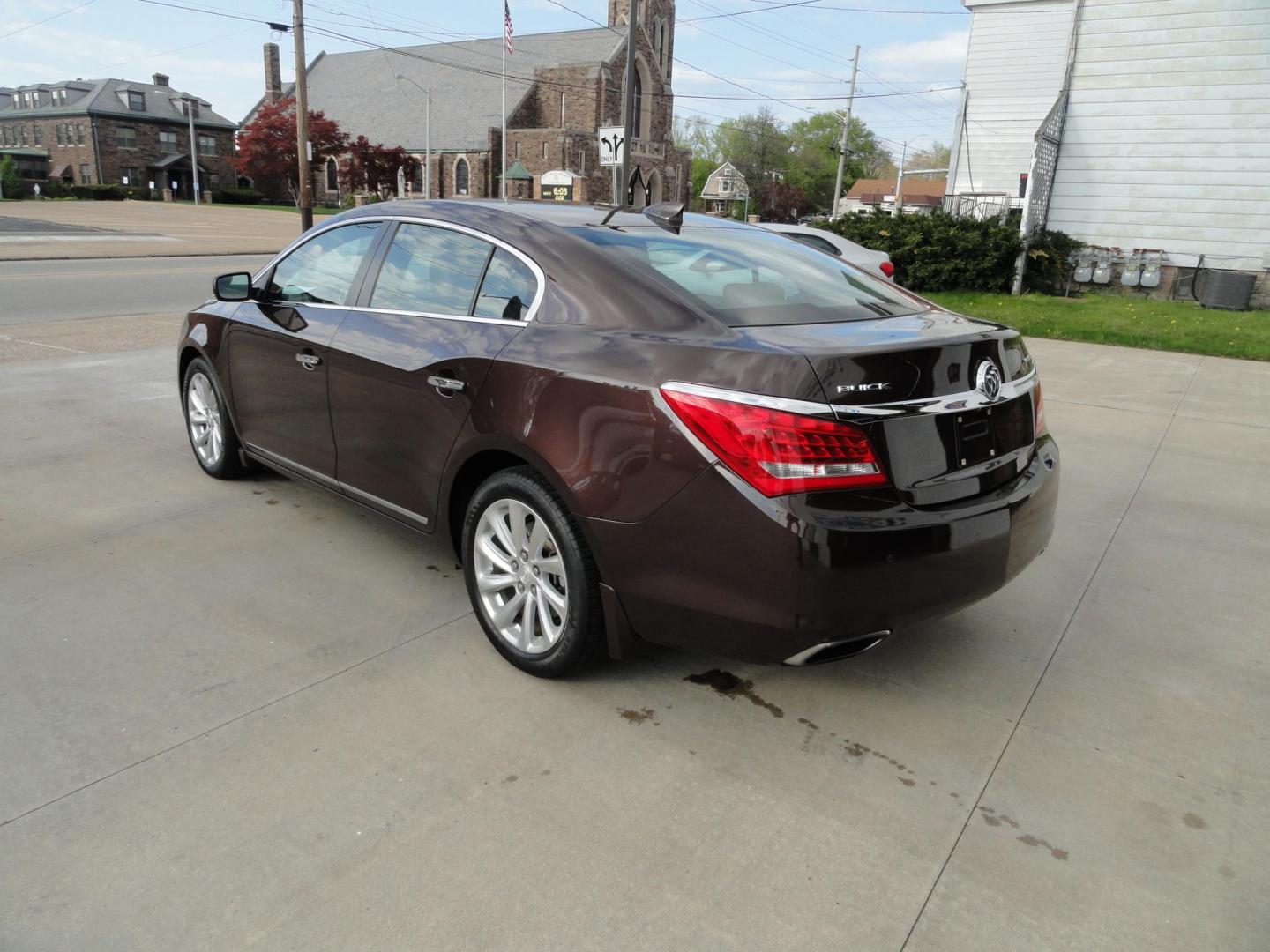 2016 Burnished Brandy Metallic /Coco/Dune Buick LaCrosse Leather Package (1G4GB5G35GF) with an 3.6L V6 DOHC 24V FFV engine, 6 Speed automatic transmission, located at 827 W 26th Street, Erie, PA, 16508, (814) 455-3401, 42.105431, -80.090942 - Thanks for looking at our two-owner accident and rust-free recent arrival. This is the Leather Package trim level with Driver confidence package which includes adaptive HID headlamps, front collision alert, blind spot monitoring, rear cross-traffic alert, foglamps and a heads-up display. This vehicl - Photo#5