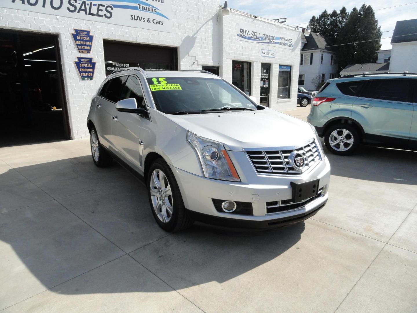 2015 Switchblade Silver Metallic /Jet Black Cadillac SRX-4 Performance Collection AWD (3GYFNFE34FS) with an 3.6L V6 DOHC 24V FFV engine, 6-Speed Automatic transmission, located at 827 W 26th Street, Erie, PA, 16508, (814) 455-3401, 42.105431, -80.090942 - Thanks for looking at our two-owner rust free like new trade in. This SUV just came back in on trade from a previous owner who trade it back in to us on a Cadillac XT5. This is the Performance model with all the options including all wheel drive, dual power heated front seats, remote start, a panora - Photo#0