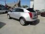 2015 Switchblade Silver Metallic /Jet Black Cadillac SRX-4 Performance Collection AWD (3GYFNFE34FS) with an 3.6L V6 DOHC 24V FFV engine, 6-Speed Automatic transmission, located at 827 W 26th Street, Erie, PA, 16508, (814) 455-3401, 42.105431, -80.090942 - Thanks for looking at our two-owner rust free like new trade in. This SUV just came back in on trade from a previous owner who trade it back in to us on a Cadillac XT5. This is the Performance model with all the options including all wheel drive, dual power heated front seats, remote start, a panora - Photo#5