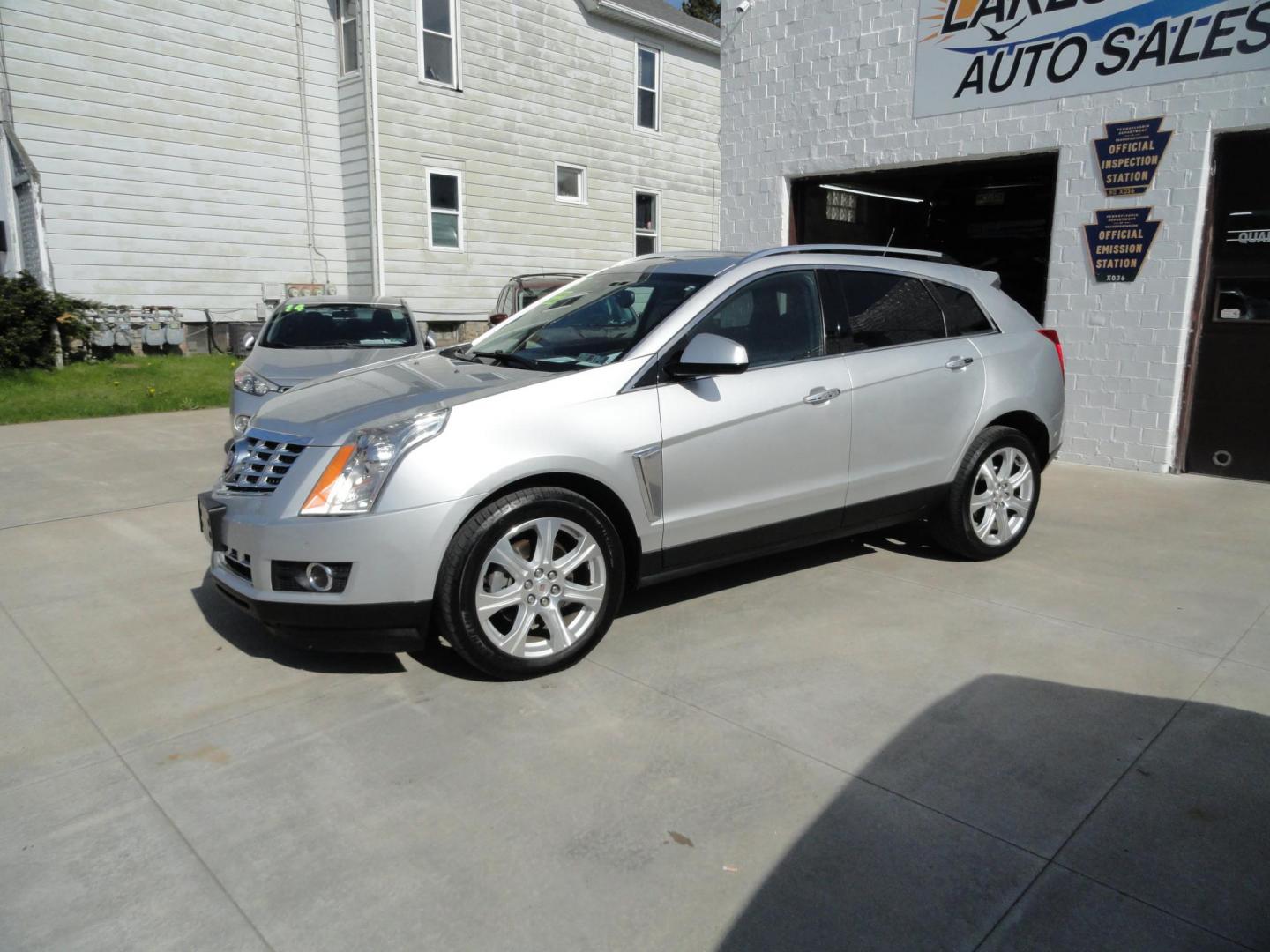 2015 Switchblade Silver Metallic /Jet Black Cadillac SRX-4 Performance Collection AWD (3GYFNFE34FS) with an 3.6L V6 DOHC 24V FFV engine, 6-Speed Automatic transmission, located at 827 W 26th Street, Erie, PA, 16508, (814) 455-3401, 42.105431, -80.090942 - Thanks for looking at our two-owner rust free like new trade in. This SUV just came back in on trade from a previous owner who trade it back in to us on a Cadillac XT5. This is the Performance model with all the options including all wheel drive, dual power heated front seats, remote start, a panora - Photo#6