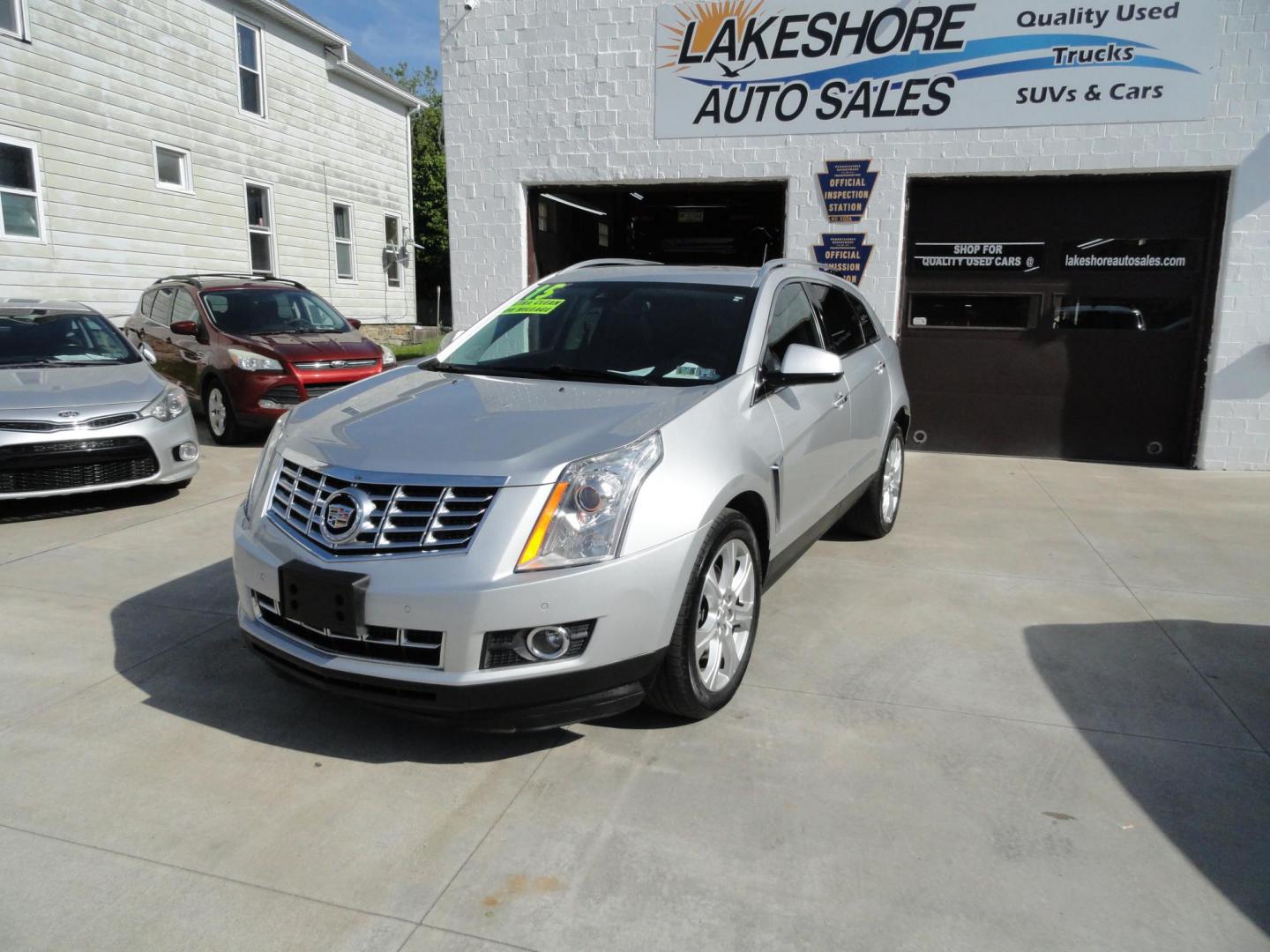 2015 Switchblade Silver Metallic /Jet Black Cadillac SRX-4 Performance Collection AWD (3GYFNFE34FS) with an 3.6L V6 DOHC 24V FFV engine, 6-Speed Automatic transmission, located at 827 W 26th Street, Erie, PA, 16508, (814) 455-3401, 42.105431, -80.090942 - Thanks for looking at our two-owner rust free like new trade in. This SUV just came back in on trade from a previous owner who trade it back in to us on a Cadillac XT5. This is the Performance model with all the options including all wheel drive, dual power heated front seats, remote start, a panora - Photo#7