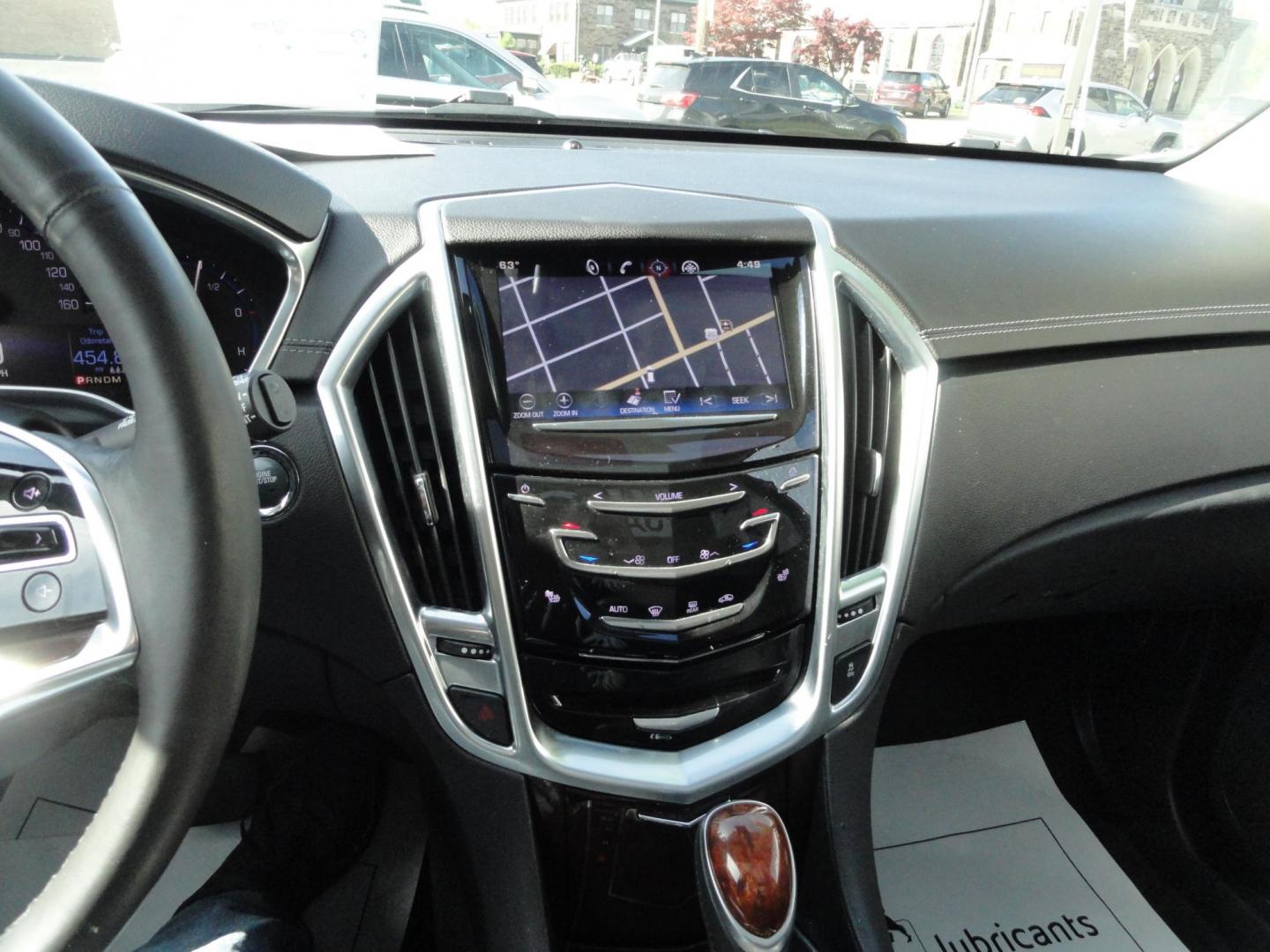 2015 Switchblade Silver Metallic /Jet Black Cadillac SRX-4 Performance Collection AWD (3GYFNFE34FS) with an 3.6L V6 DOHC 24V FFV engine, 6-Speed Automatic transmission, located at 827 W 26th Street, Erie, PA, 16508, (814) 455-3401, 42.105431, -80.090942 - Thanks for looking at our two-owner rust free like new trade in. This SUV just came back in on trade from a previous owner who trade it back in to us on a Cadillac XT5. This is the Performance model with all the options including all wheel drive, dual power heated front seats, remote start, a panora - Photo#13
