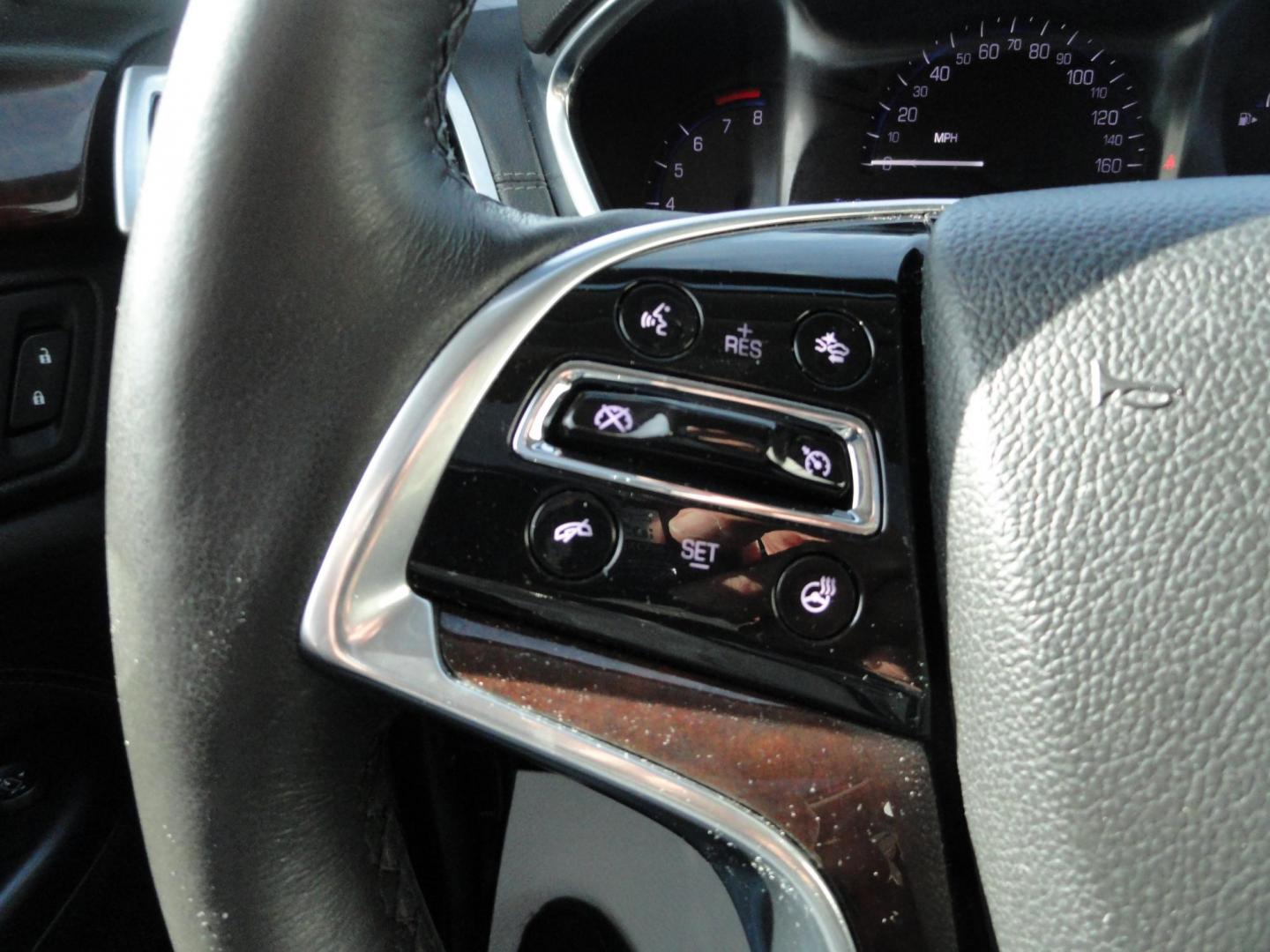 2015 Switchblade Silver Metallic /Jet Black Cadillac SRX-4 Performance Collection AWD (3GYFNFE34FS) with an 3.6L V6 DOHC 24V FFV engine, 6-Speed Automatic transmission, located at 827 W 26th Street, Erie, PA, 16508, (814) 455-3401, 42.105431, -80.090942 - Thanks for looking at our two-owner rust free like new trade in. This SUV just came back in on trade from a previous owner who trade it back in to us on a Cadillac XT5. This is the Performance model with all the options including all wheel drive, dual power heated front seats, remote start, a panora - Photo#19