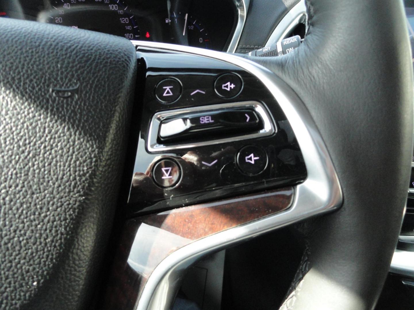 2015 Switchblade Silver Metallic /Jet Black Cadillac SRX-4 Performance Collection AWD (3GYFNFE34FS) with an 3.6L V6 DOHC 24V FFV engine, 6-Speed Automatic transmission, located at 827 W 26th Street, Erie, PA, 16508, (814) 455-3401, 42.105431, -80.090942 - Thanks for looking at our two-owner rust free like new trade in. This SUV just came back in on trade from a previous owner who trade it back in to us on a Cadillac XT5. This is the Performance model with all the options including all wheel drive, dual power heated front seats, remote start, a panora - Photo#18