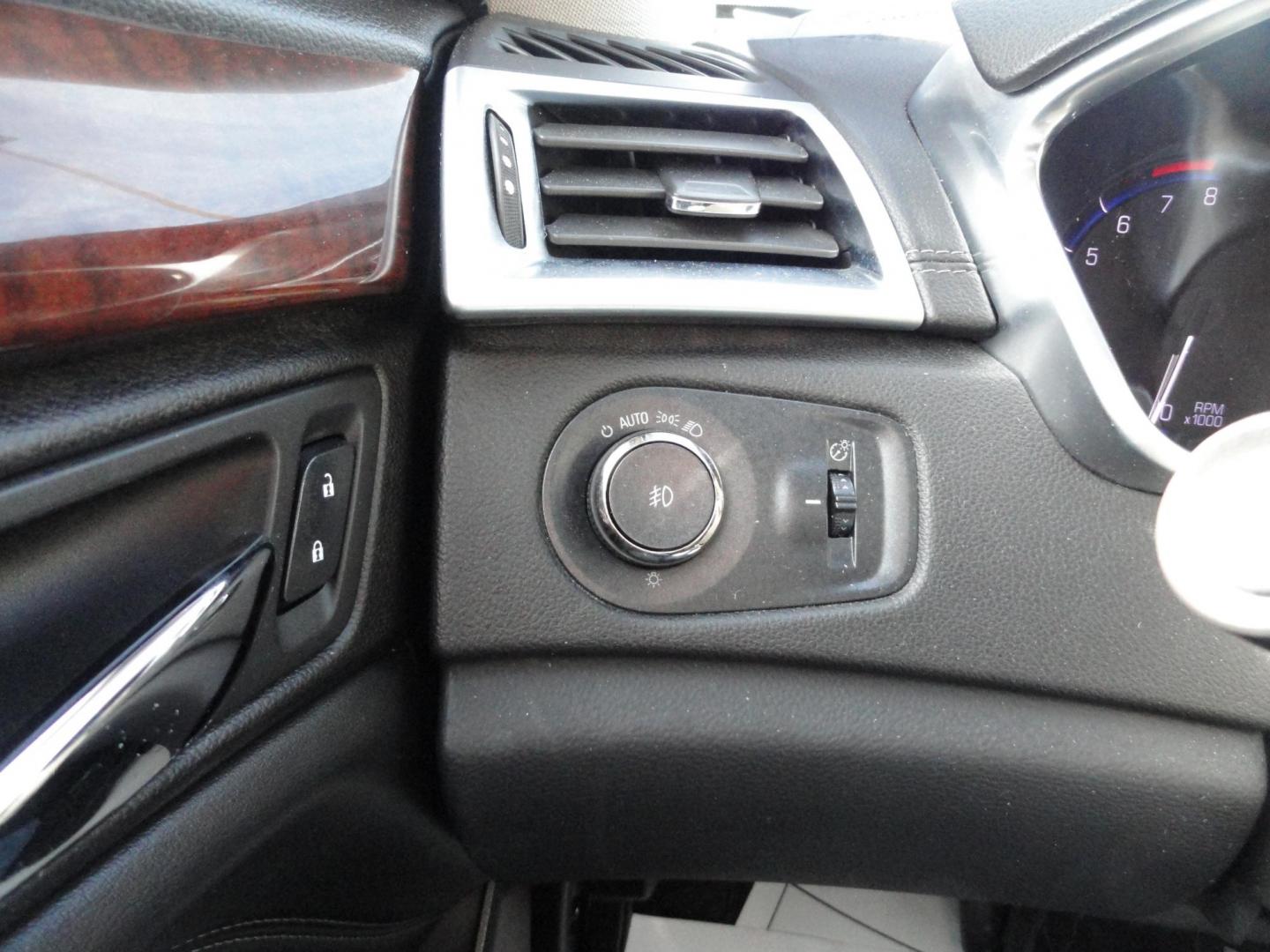 2015 Switchblade Silver Metallic /Jet Black Cadillac SRX-4 Performance Collection AWD (3GYFNFE34FS) with an 3.6L V6 DOHC 24V FFV engine, 6-Speed Automatic transmission, located at 827 W 26th Street, Erie, PA, 16508, (814) 455-3401, 42.105431, -80.090942 - Thanks for looking at our two-owner rust free like new trade in. This SUV just came back in on trade from a previous owner who trade it back in to us on a Cadillac XT5. This is the Performance model with all the options including all wheel drive, dual power heated front seats, remote start, a panora - Photo#21