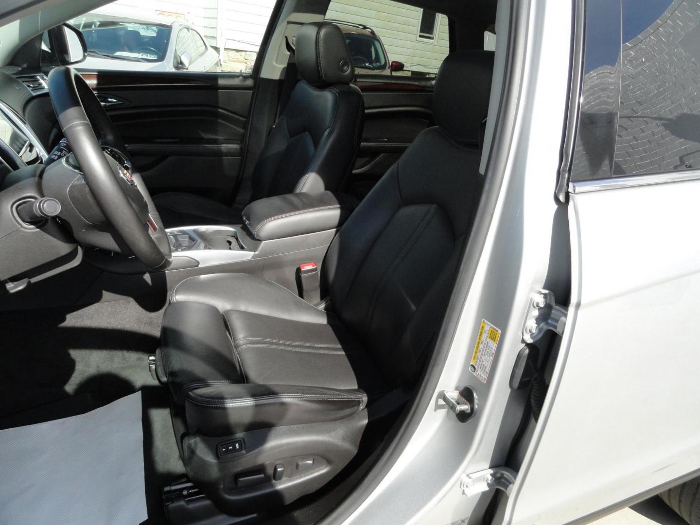 2015 Switchblade Silver Metallic /Jet Black Cadillac SRX-4 Performance Collection AWD (3GYFNFE34FS) with an 3.6L V6 DOHC 24V FFV engine, 6-Speed Automatic transmission, located at 827 W 26th Street, Erie, PA, 16508, (814) 455-3401, 42.105431, -80.090942 - Thanks for looking at our two-owner rust free like new trade in. This SUV just came back in on trade from a previous owner who trade it back in to us on a Cadillac XT5. This is the Performance model with all the options including all wheel drive, dual power heated front seats, remote start, a panora - Photo#23
