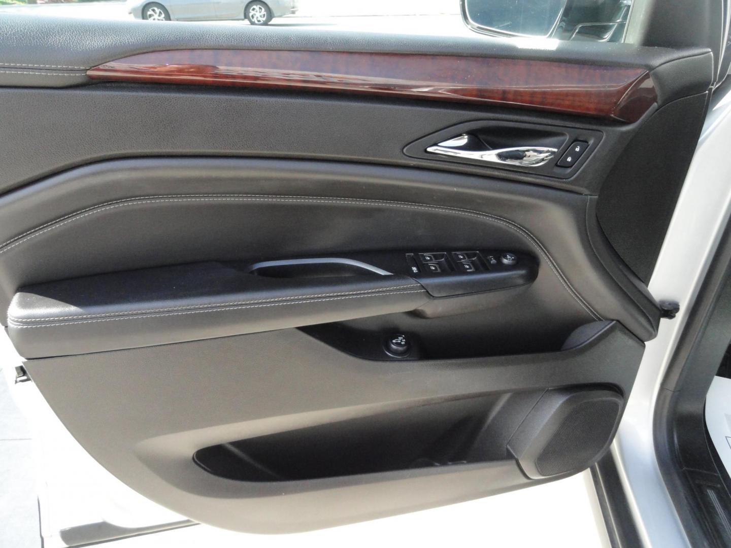2015 Switchblade Silver Metallic /Jet Black Cadillac SRX-4 Performance Collection AWD (3GYFNFE34FS) with an 3.6L V6 DOHC 24V FFV engine, 6-Speed Automatic transmission, located at 827 W 26th Street, Erie, PA, 16508, (814) 455-3401, 42.105431, -80.090942 - Thanks for looking at our two-owner rust free like new trade in. This SUV just came back in on trade from a previous owner who trade it back in to us on a Cadillac XT5. This is the Performance model with all the options including all wheel drive, dual power heated front seats, remote start, a panora - Photo#27