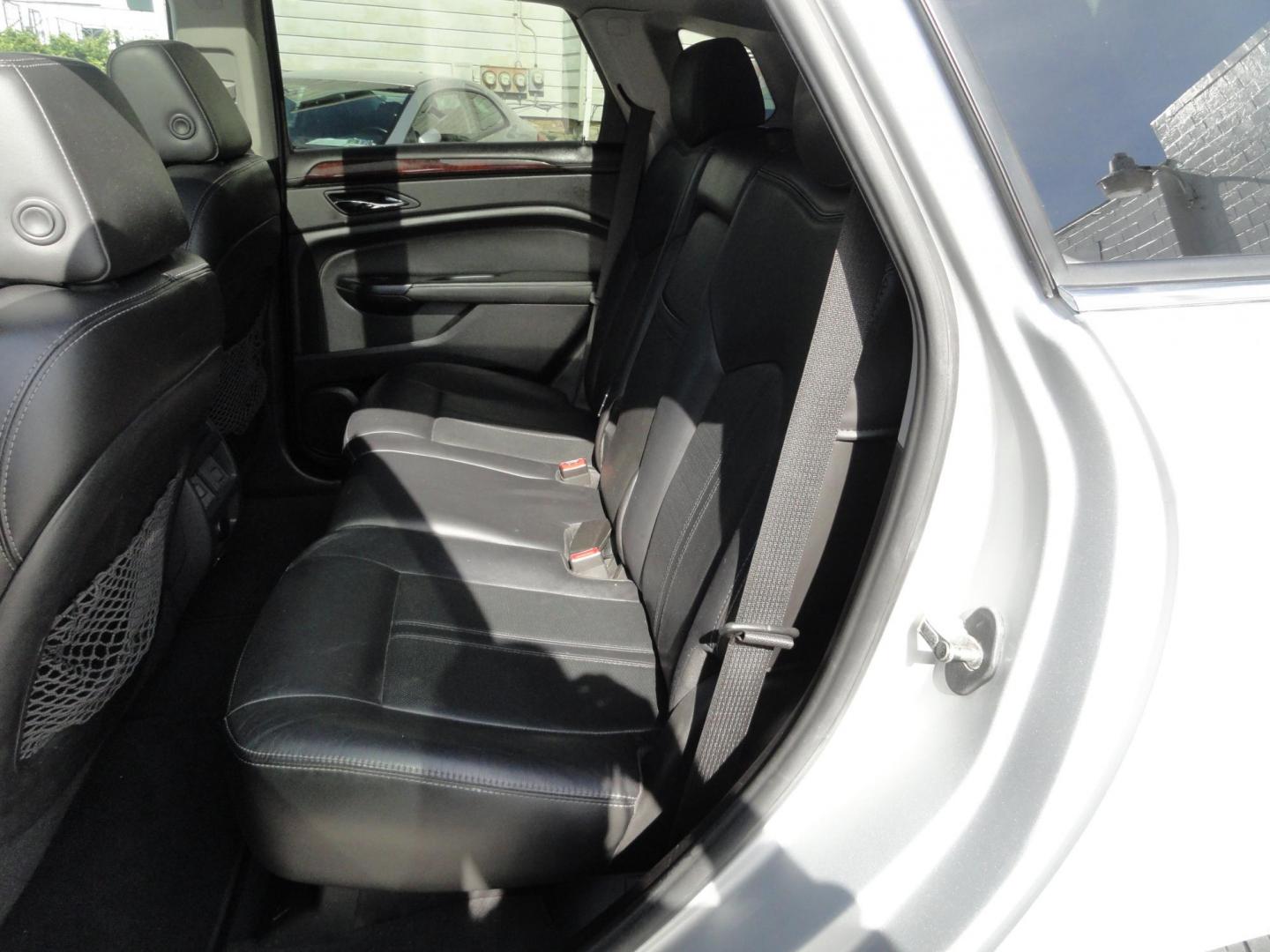2015 Switchblade Silver Metallic /Jet Black Cadillac SRX-4 Performance Collection AWD (3GYFNFE34FS) with an 3.6L V6 DOHC 24V FFV engine, 6-Speed Automatic transmission, located at 827 W 26th Street, Erie, PA, 16508, (814) 455-3401, 42.105431, -80.090942 - Thanks for looking at our two-owner rust free like new trade in. This SUV just came back in on trade from a previous owner who trade it back in to us on a Cadillac XT5. This is the Performance model with all the options including all wheel drive, dual power heated front seats, remote start, a panora - Photo#28