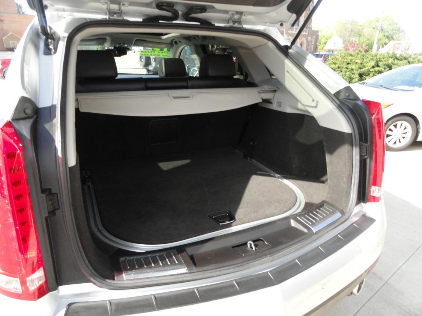 2015 Switchblade Silver Metallic /Jet Black Cadillac SRX-4 Performance Collection AWD (3GYFNFE34FS) with an 3.6L V6 DOHC 24V FFV engine, 6-Speed Automatic transmission, located at 827 W 26th Street, Erie, PA, 16508, (814) 455-3401, 42.105431, -80.090942 - Thanks for looking at our two-owner rust free like new trade in. This SUV just came back in on trade from a previous owner who trade it back in to us on a Cadillac XT5. This is the Performance model with all the options including all wheel drive, dual power heated front seats, remote start, a panora - Photo#33