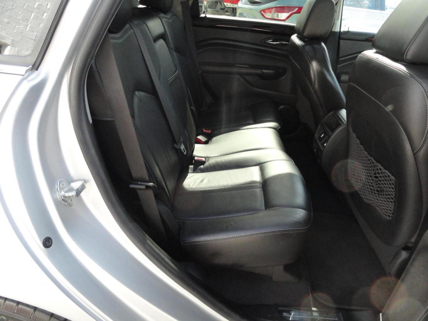2015 Switchblade Silver Metallic /Jet Black Cadillac SRX-4 Performance Collection AWD (3GYFNFE34FS) with an 3.6L V6 DOHC 24V FFV engine, 6-Speed Automatic transmission, located at 827 W 26th Street, Erie, PA, 16508, (814) 455-3401, 42.105431, -80.090942 - Thanks for looking at our two-owner rust free like new trade in. This SUV just came back in on trade from a previous owner who trade it back in to us on a Cadillac XT5. This is the Performance model with all the options including all wheel drive, dual power heated front seats, remote start, a panora - Photo#35