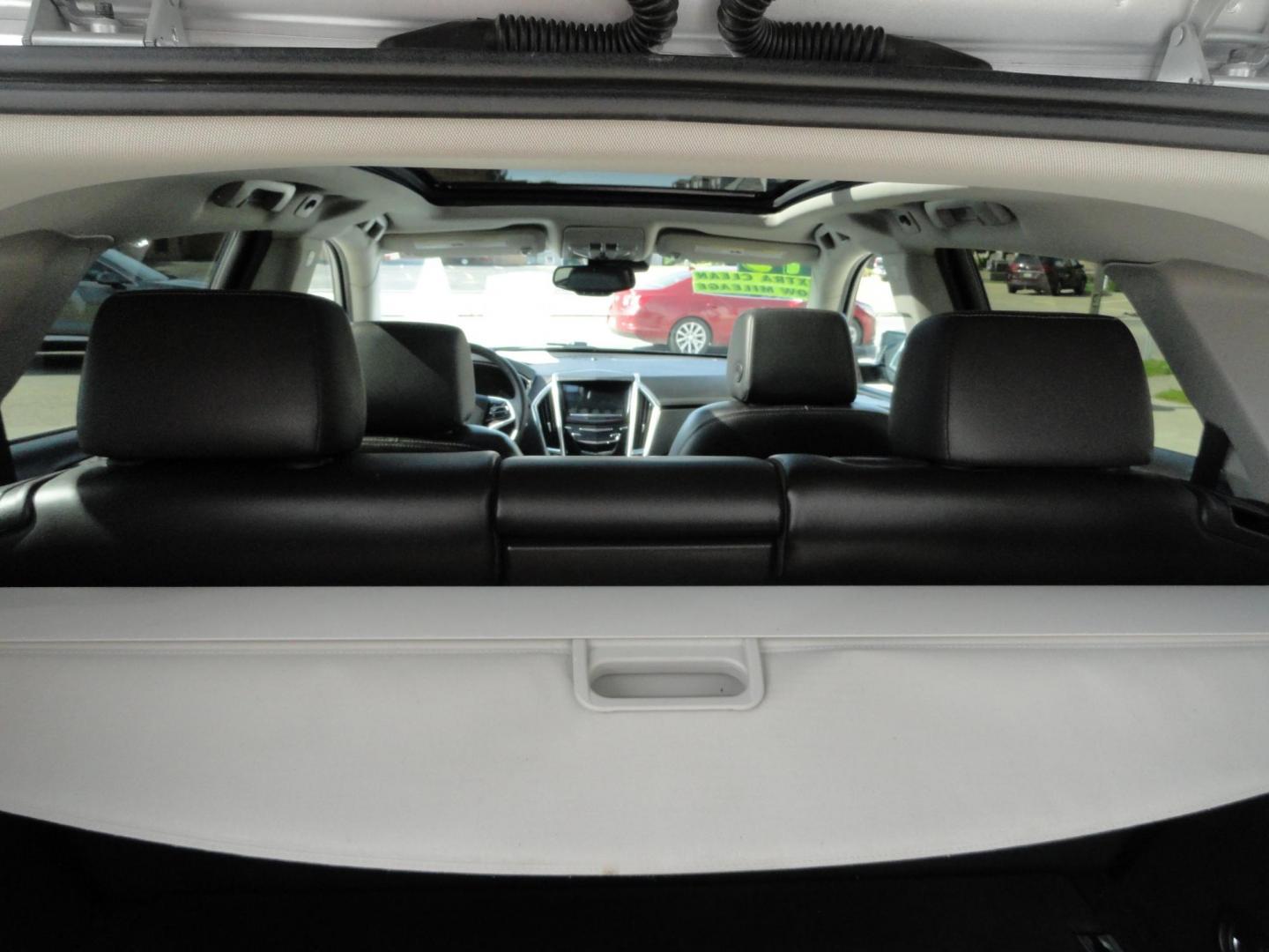 2015 Switchblade Silver Metallic /Jet Black Cadillac SRX-4 Performance Collection AWD (3GYFNFE34FS) with an 3.6L V6 DOHC 24V FFV engine, 6-Speed Automatic transmission, located at 827 W 26th Street, Erie, PA, 16508, (814) 455-3401, 42.105431, -80.090942 - Thanks for looking at our two-owner rust free like new trade in. This SUV just came back in on trade from a previous owner who trade it back in to us on a Cadillac XT5. This is the Performance model with all the options including all wheel drive, dual power heated front seats, remote start, a panora - Photo#34