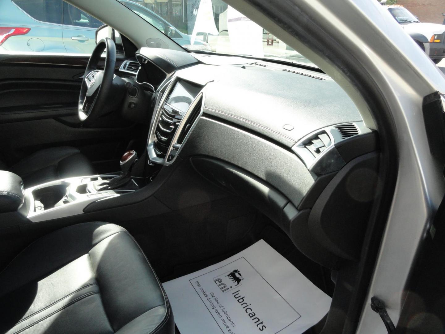 2015 Switchblade Silver Metallic /Jet Black Cadillac SRX-4 Performance Collection AWD (3GYFNFE34FS) with an 3.6L V6 DOHC 24V FFV engine, 6-Speed Automatic transmission, located at 827 W 26th Street, Erie, PA, 16508, (814) 455-3401, 42.105431, -80.090942 - Thanks for looking at our two-owner rust free like new trade in. This SUV just came back in on trade from a previous owner who trade it back in to us on a Cadillac XT5. This is the Performance model with all the options including all wheel drive, dual power heated front seats, remote start, a panora - Photo#37