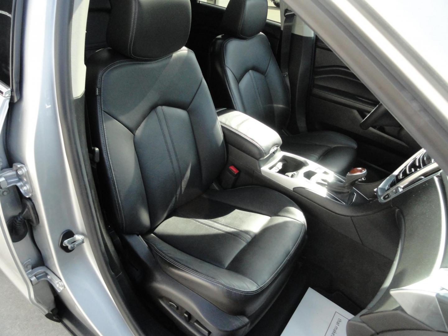 2015 Switchblade Silver Metallic /Jet Black Cadillac SRX-4 Performance Collection AWD (3GYFNFE34FS) with an 3.6L V6 DOHC 24V FFV engine, 6-Speed Automatic transmission, located at 827 W 26th Street, Erie, PA, 16508, (814) 455-3401, 42.105431, -80.090942 - Thanks for looking at our two-owner rust free like new trade in. This SUV just came back in on trade from a previous owner who trade it back in to us on a Cadillac XT5. This is the Performance model with all the options including all wheel drive, dual power heated front seats, remote start, a panora - Photo#38
